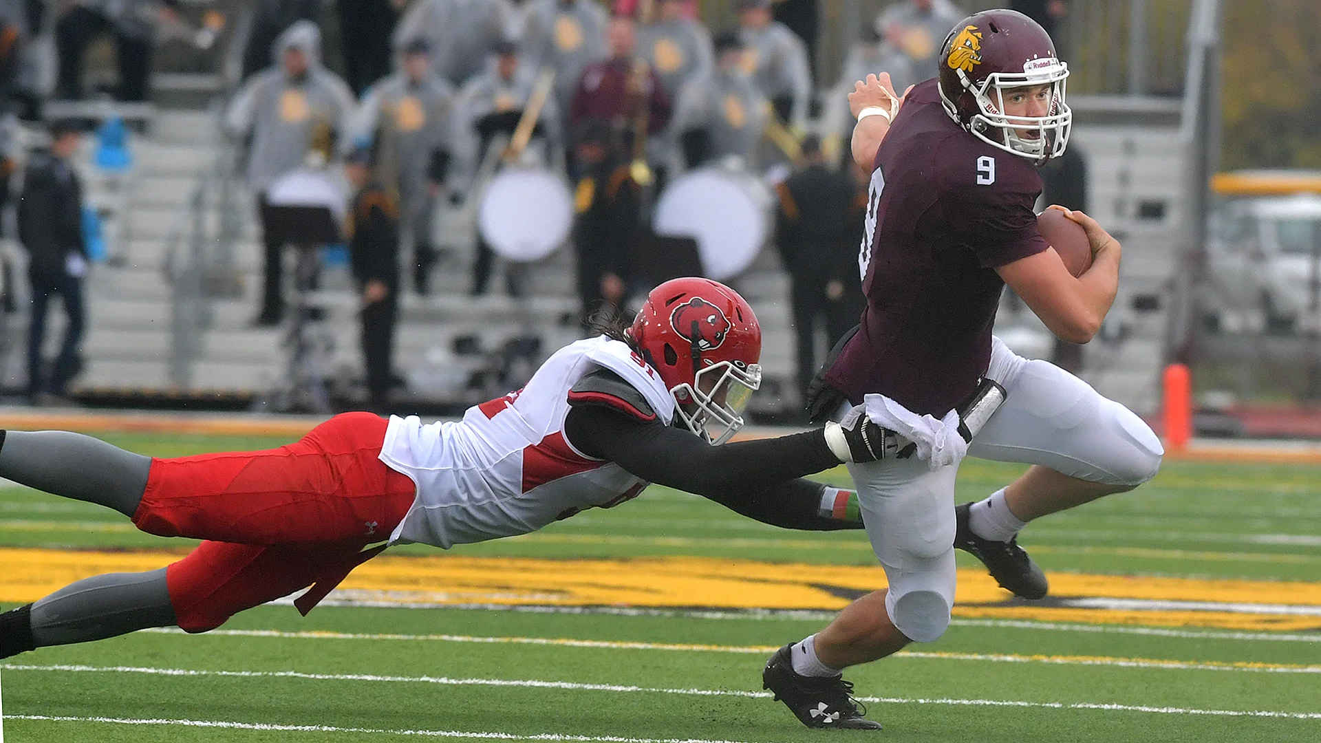 UMD football derails Minot State 37-0 in rainy Homecoming game