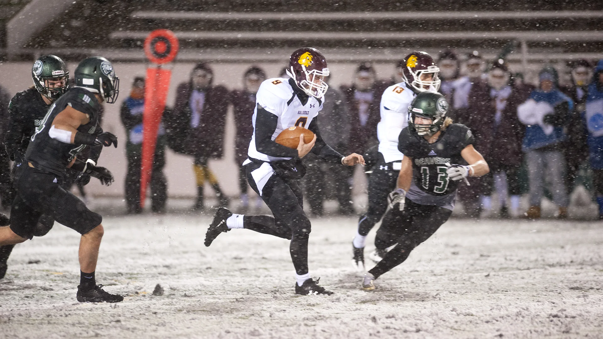 UMD football prevails in horrid Thursday Night Football conditons against Bemidji St.