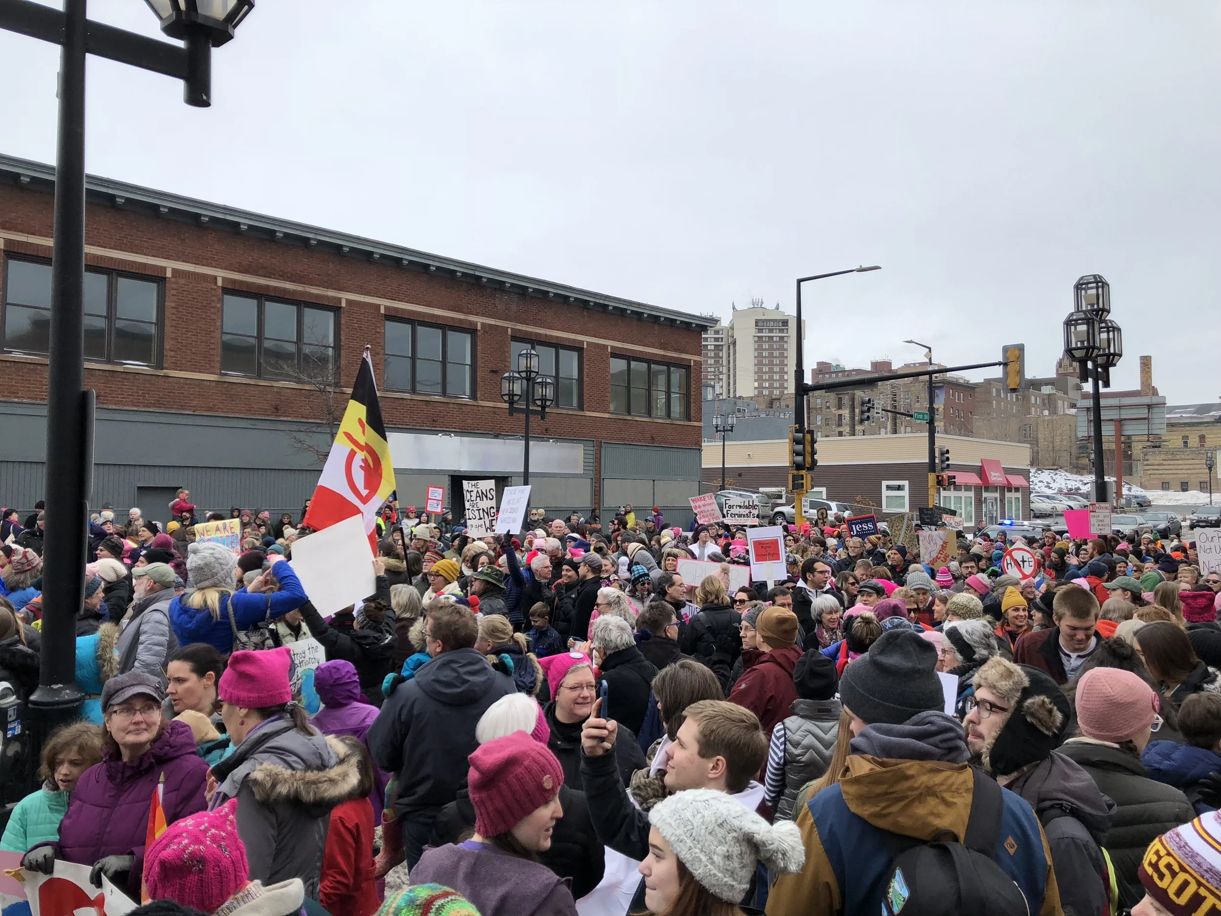 Marchers moved down West First Street as they yelled chants. Photo by Zack Benz