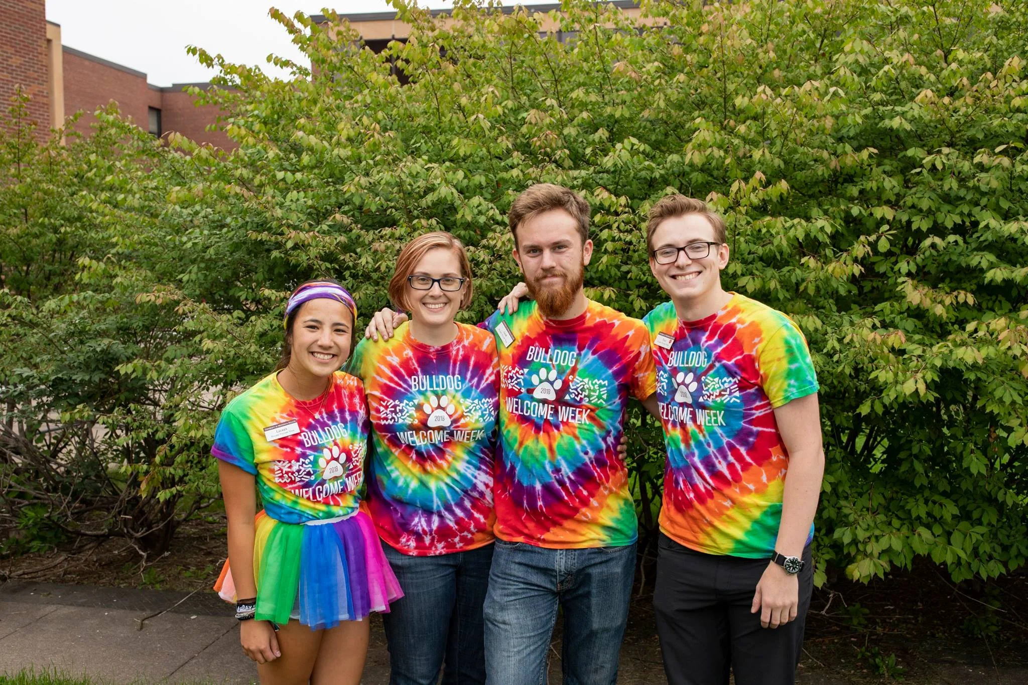 Welcome Week interns Lauren Kotz, Paul Cerar and Jacob G. Larsen pose with Emily Borra. Photo by Nick Vittorio