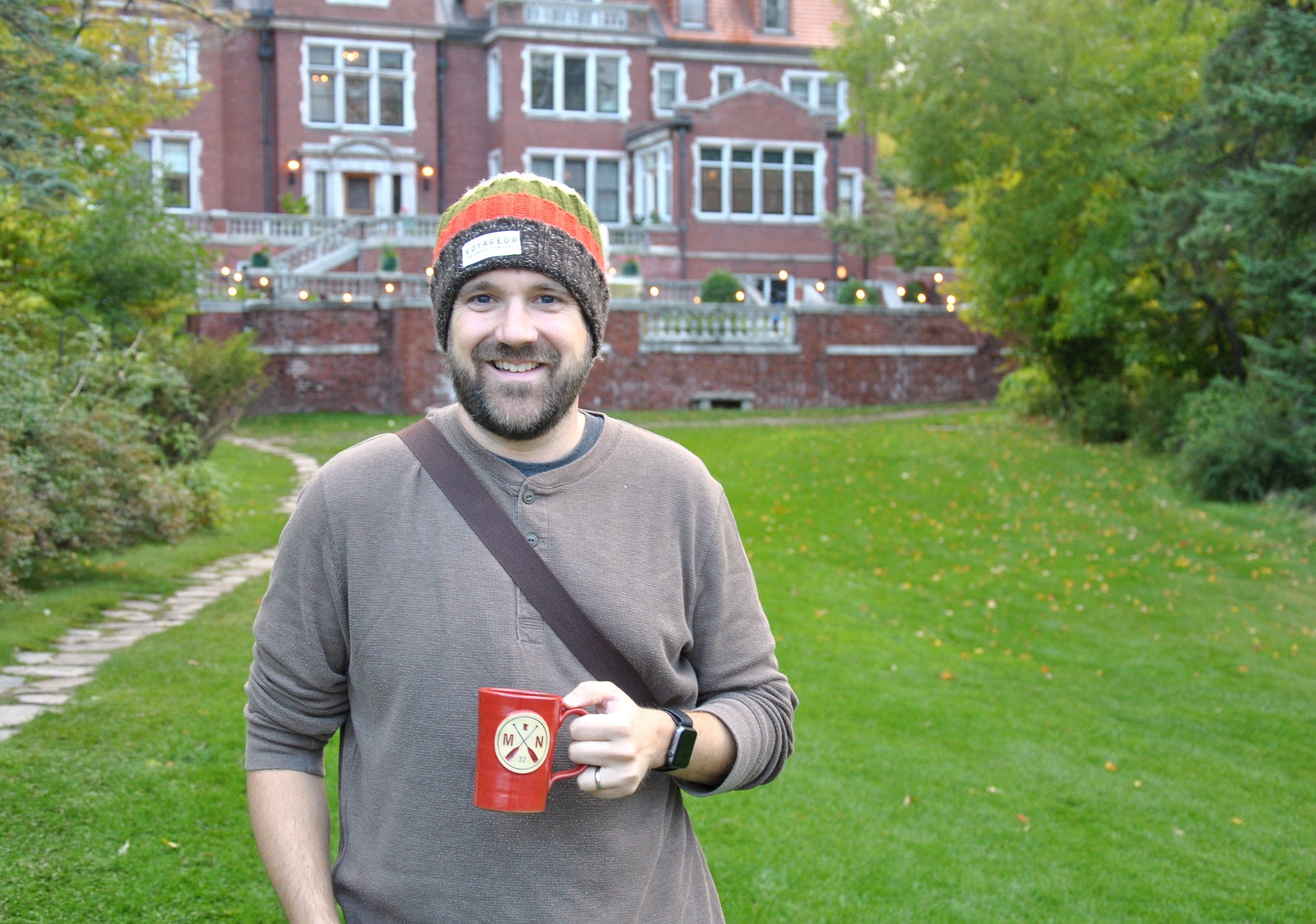 Dan Hartman, the museum director at Glensheen, standing in front of the mansion on Oct. 6, 2018. Hartman has been the director since 2013. Photo by Rebecca Kottke