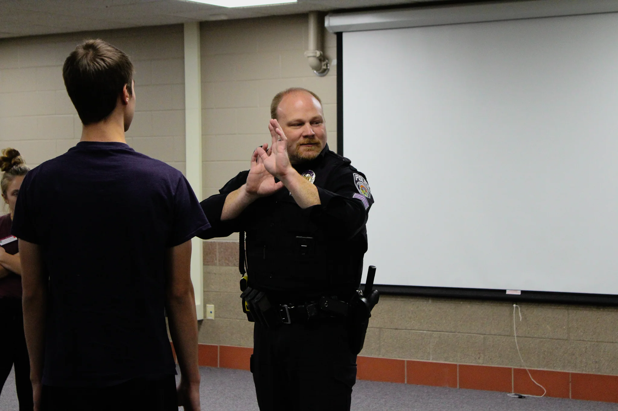 Sgt. Chris Shovein with the UMDPD demonstrates self-defense techniques. Photo by: Morgan Pint