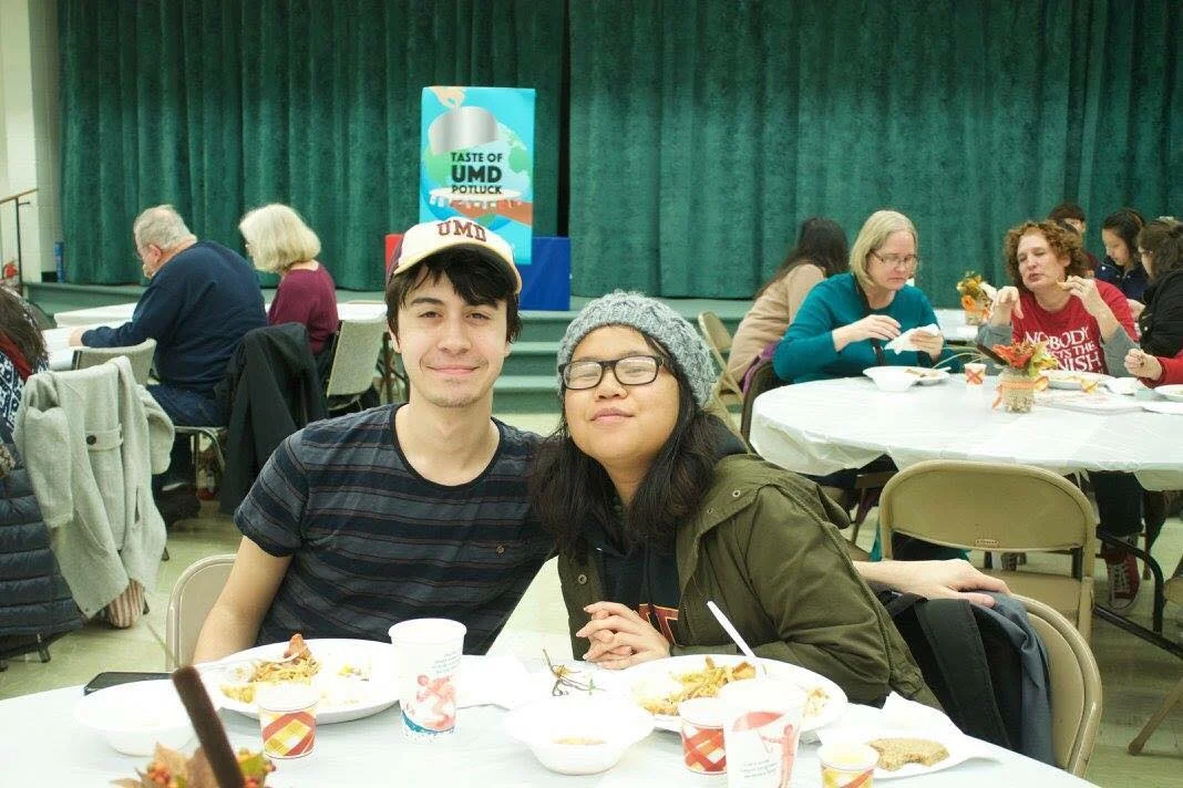 Dominic Bisogno and Suenary Philavanh at the 2017 potluck. It was Philavanh’s second year at the event. The first year she was a chef with her student organization Asian Pacific American Association. The second year she went to support the event. Photo courtesy International Club