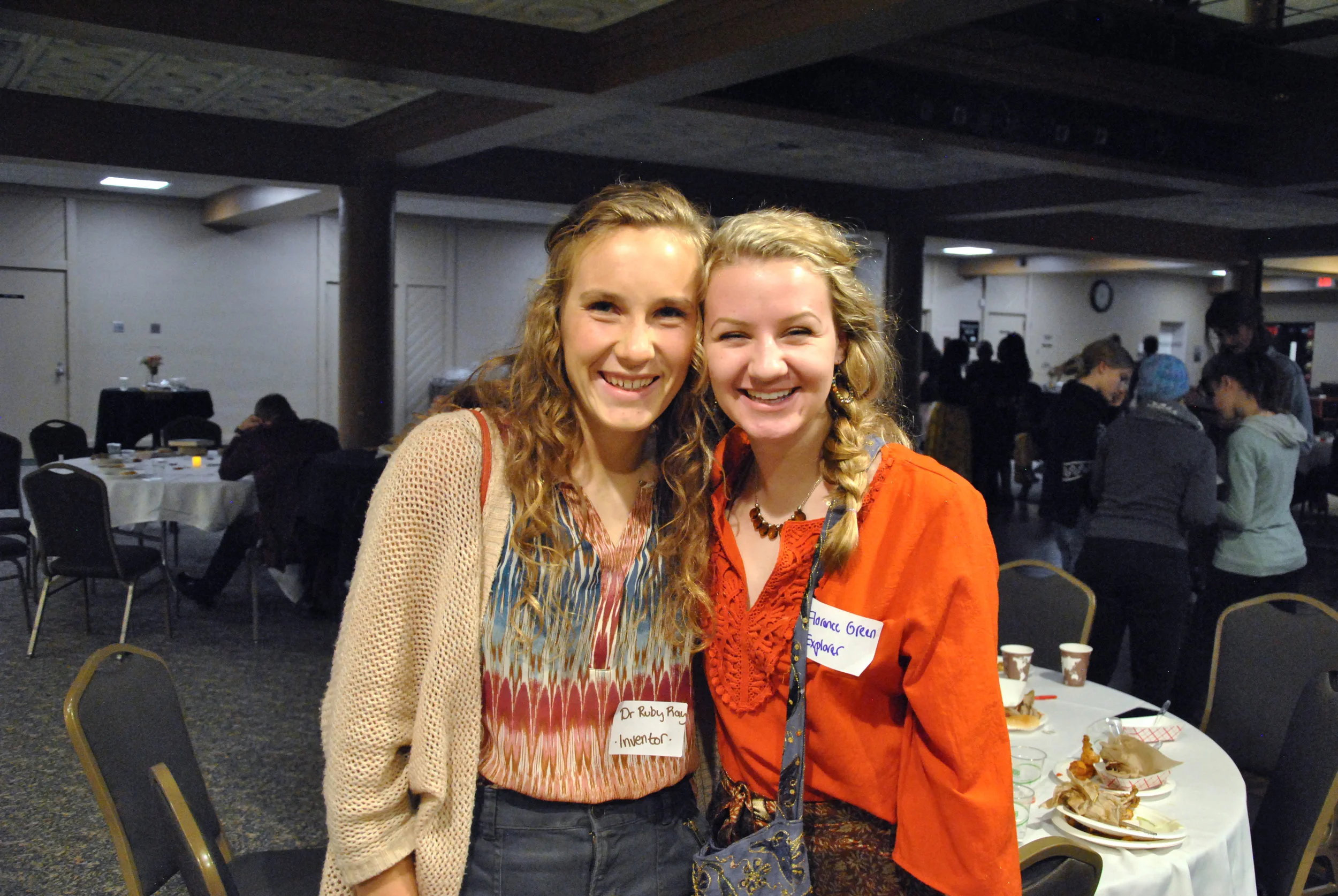 First-year students Grace Aspenson and Sarah Dvoracek participating in Murder Mystery at Kirby Ballroom on Nov. 2, 2018. Aspenson found out about the event from her chemistry class. Photo by Rebecca Kottke