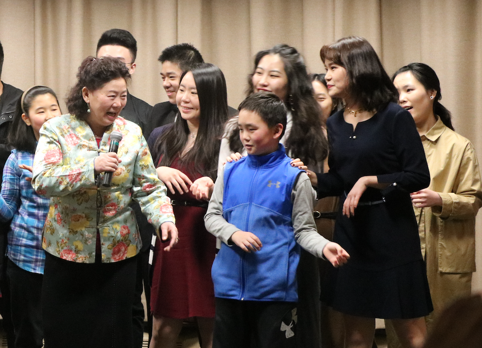 Xiaojing Liu (Far right) with other volunteers and performers. Photo by Jakob Bermas