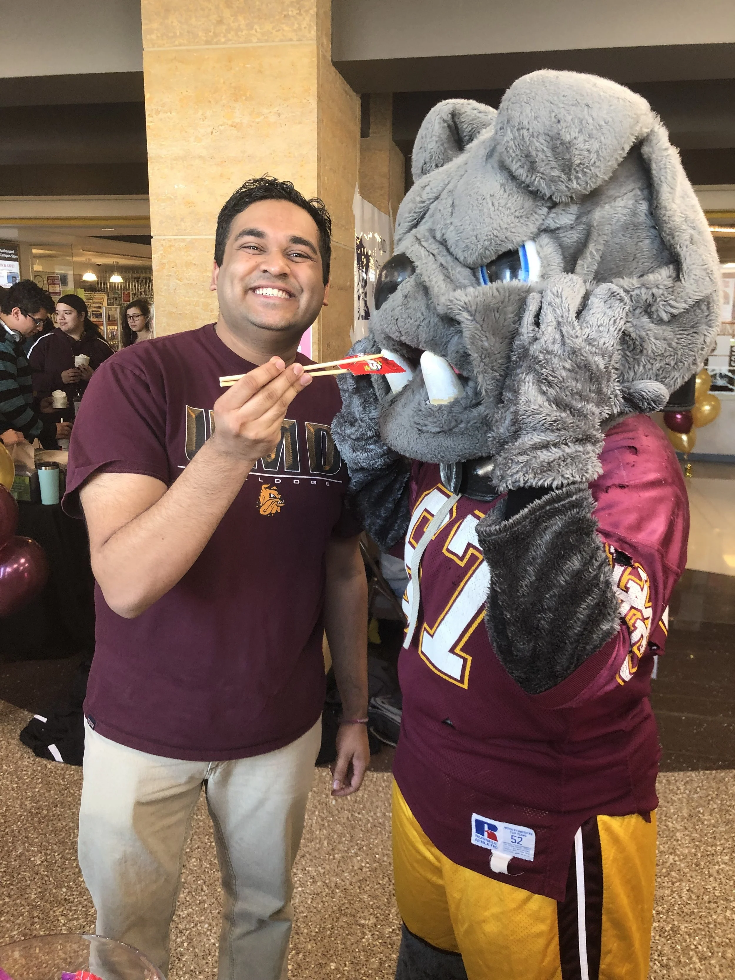 Bhakta having fun with Champ. Photo courtesy of Neal Bhakta.