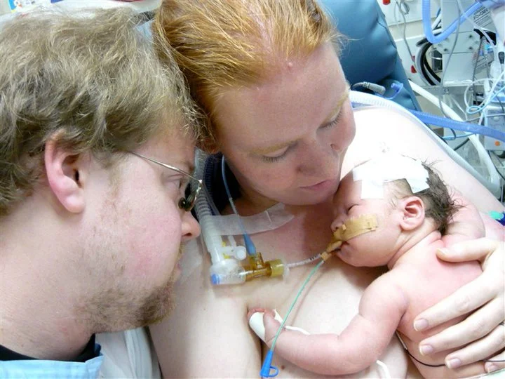 My favorite picture of us as a family of four minus one. Evan's big sister Julia Rose was with us in memory.