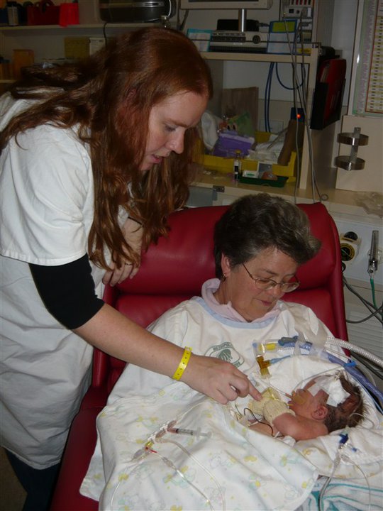 Nana's first time holding Evan - June 20, 2010