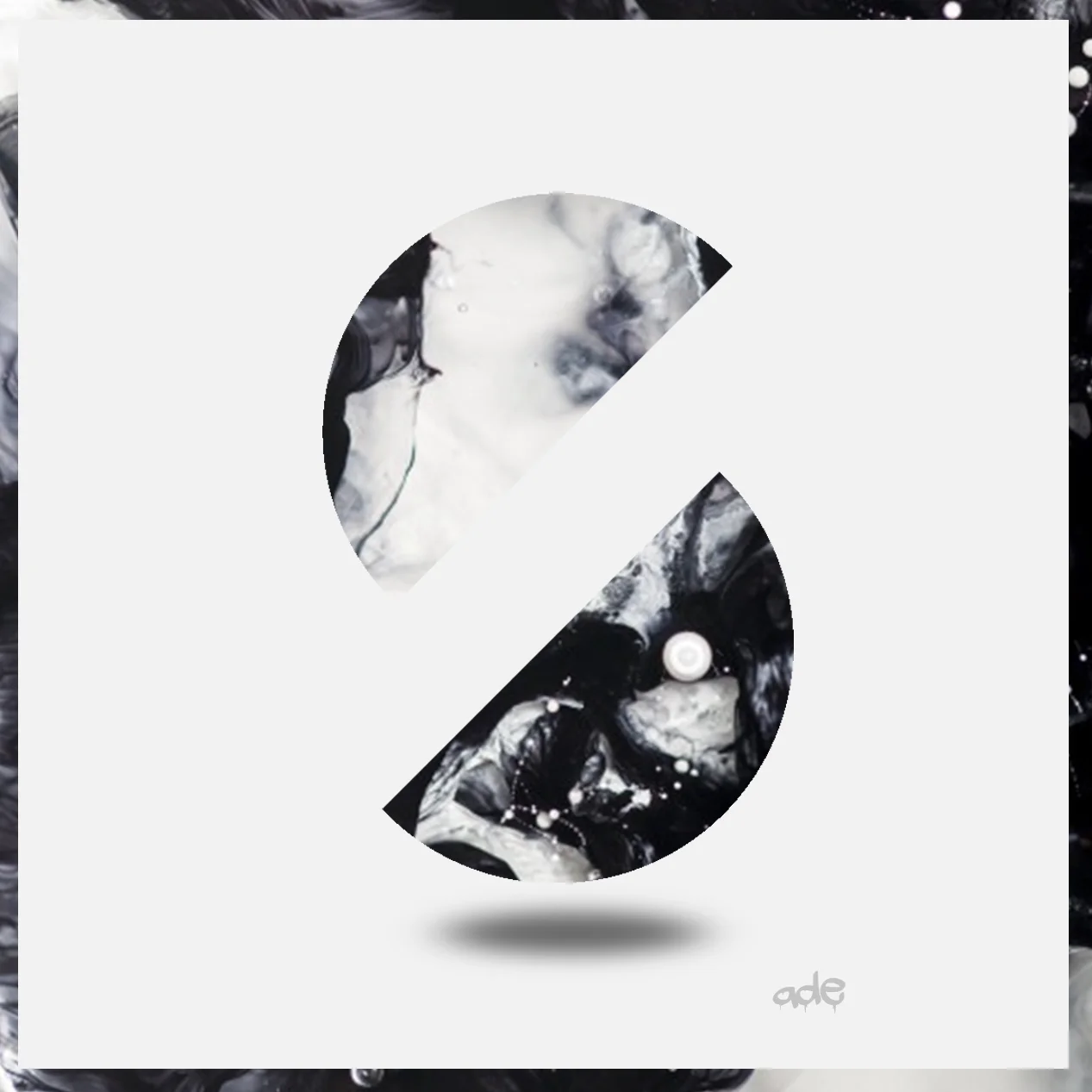 Abstract black and white marbled design with white splashes inside a stylized letter 'c' and a shadow below, on a light gray background.