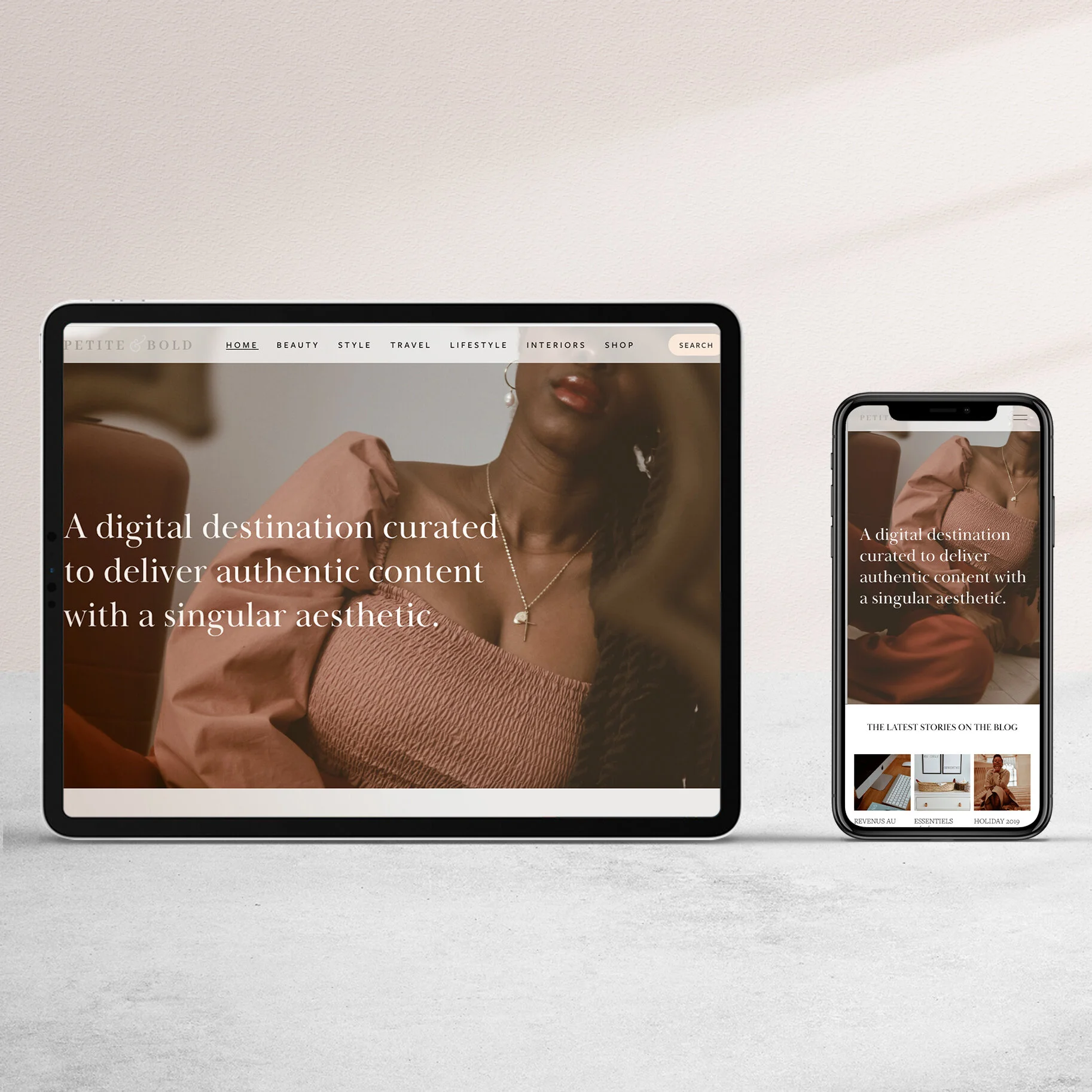 A branded website displayed on a tablet and smartphone, featuring a woman in a pink dress with jewelry, promoting curated authentic content with a modern design.