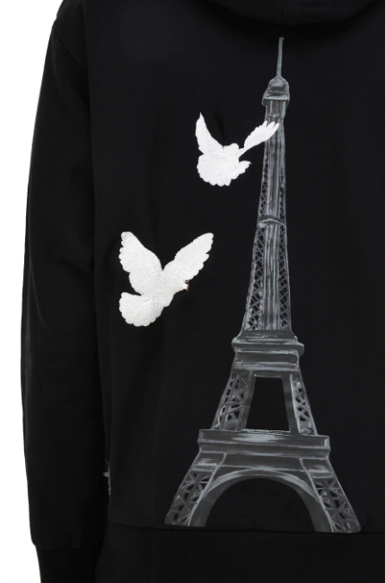 Black hoodie with a graphic of the Eiffel Tower and two white doves flying near it, 3PARADIS