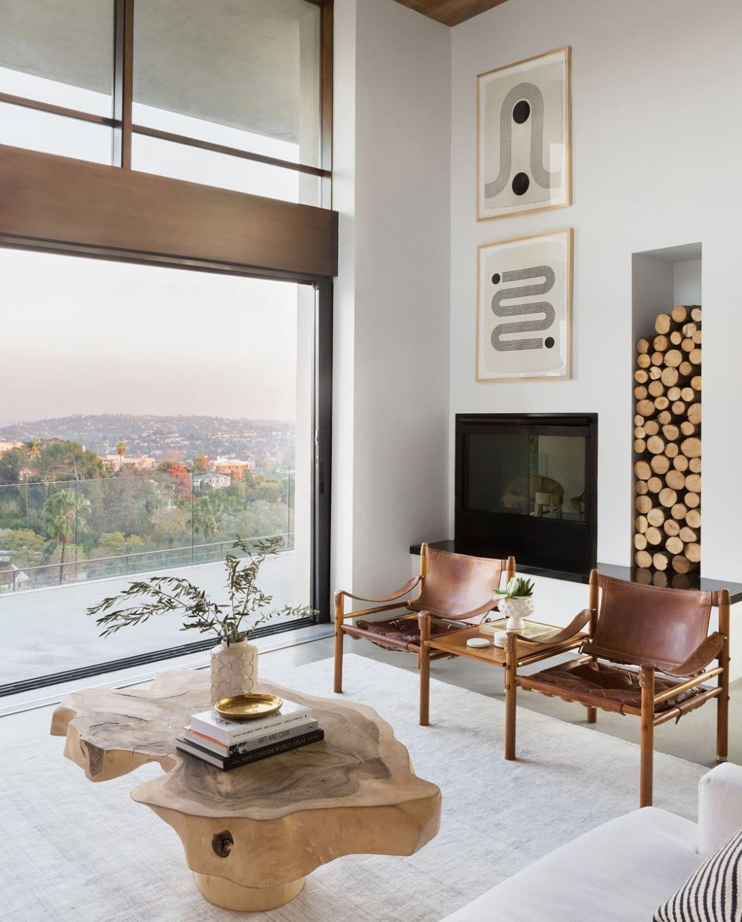 Source . Emily Henderson and her team worked their magic on this home. I apparently have a thing for naturally shaped wood tables!