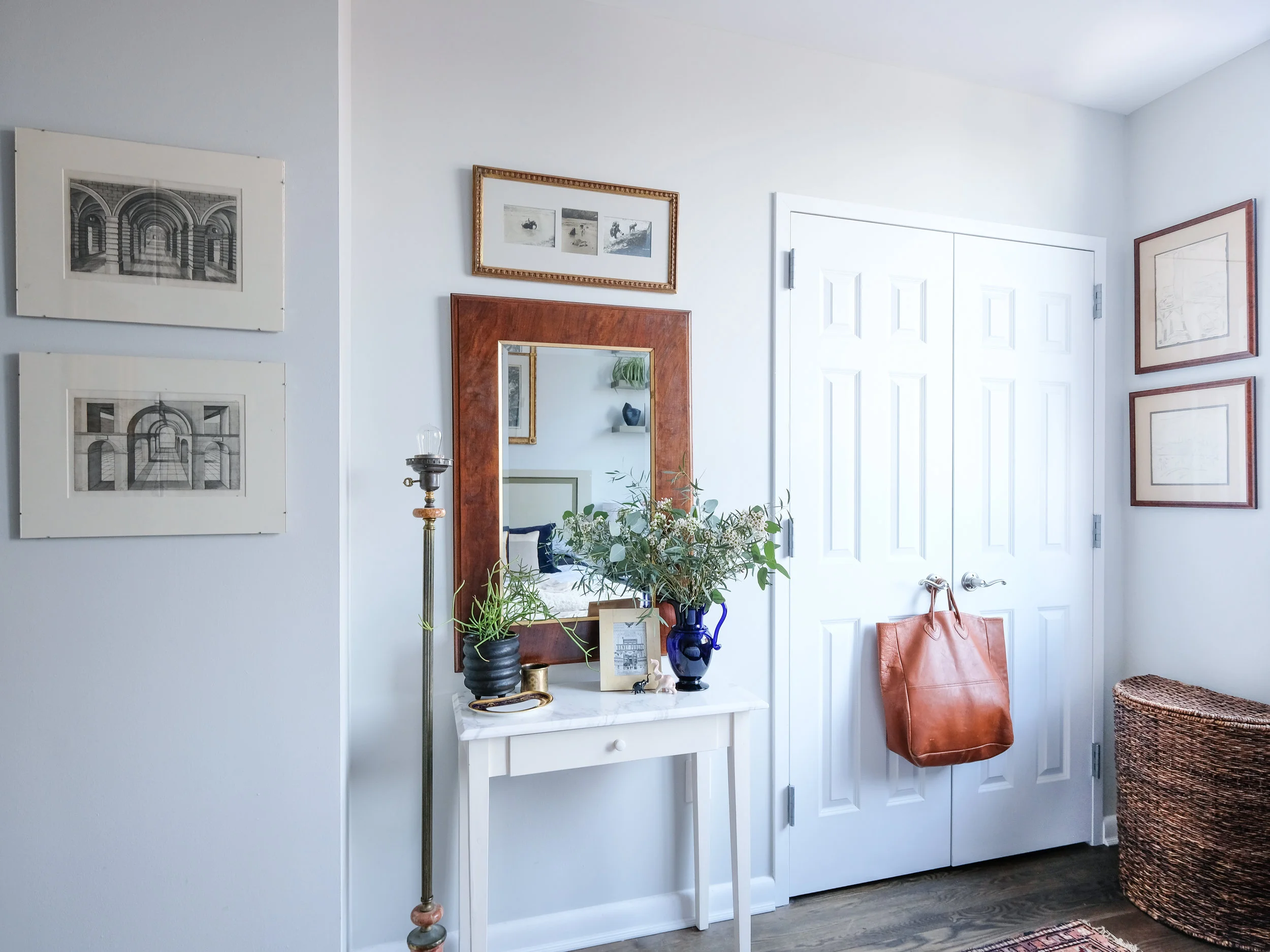 Wooden frames are another way to add this natural material to your space without it being over-powering.