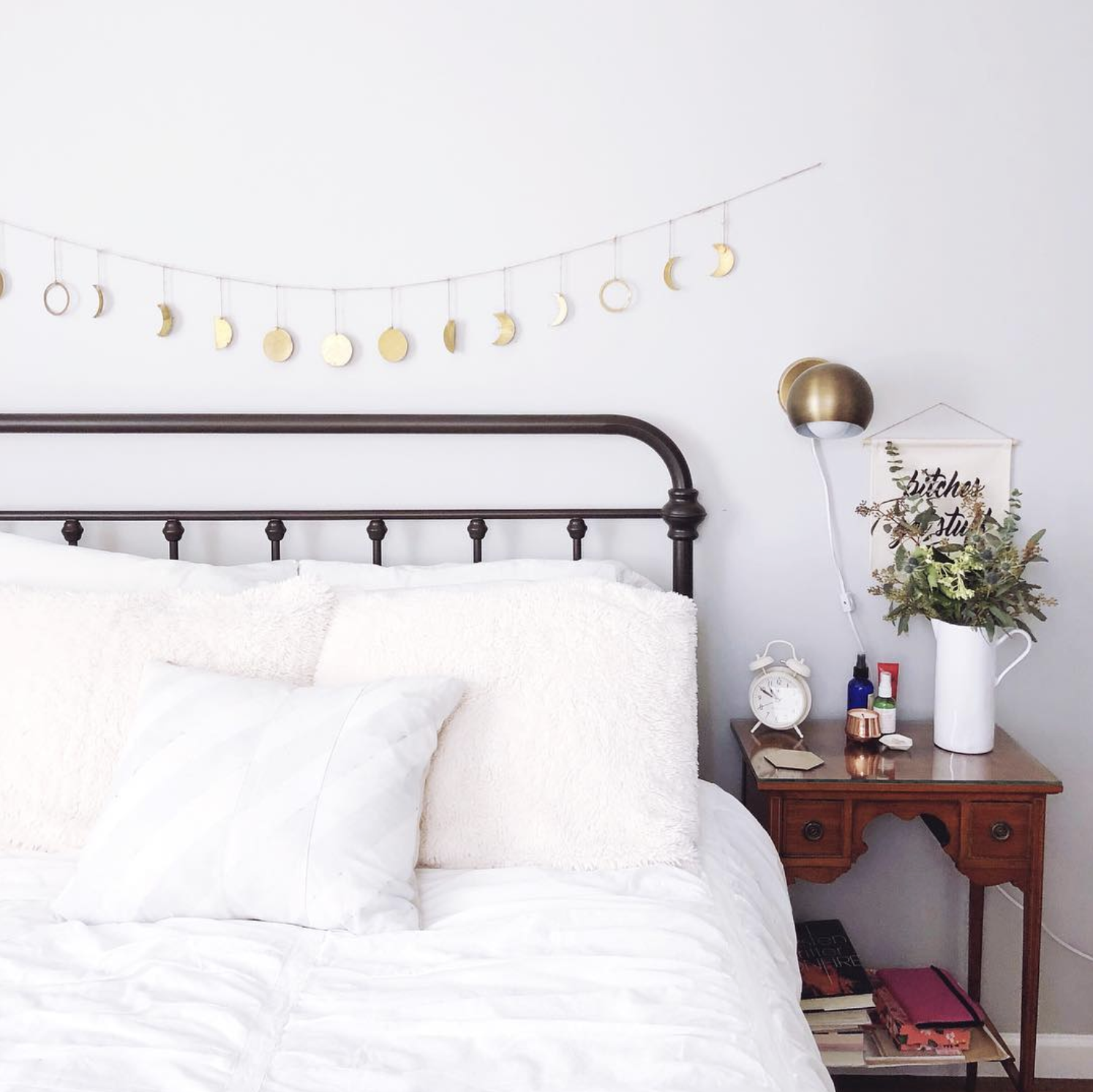 Source . Have you met my friend Sarah from @_thegrandapt? This moon phase hanging over her bed is gorgeous and sounds like a wind chime in person.