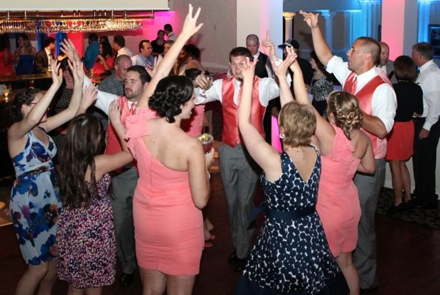 We are moving into the busiest time of year for weddings. This is also the time of year we get calls and emails from our couples that are filling out their planners and get to the section about “music requests” which leads them to ask how many songs they should request. Music can be an important part of your wedding reception. It can help set the tone, show off your personality, and bring energy to the reception, so it is important to make sure that your music selection sets the right mood. So how many requests should I make on my ‘Music Requests” page? Let’s look at the numbers. The average wedding reception in the State College and Altoona area is about 5 hours. This often includes a cocktail hour. Most songs average about 3 minutes. This means you should request 100 songs right? Well, not exactly. Keep in mind after cocktail hour, your guests will be seated, you will have introductions, your dances, cake cutting, toasts, dinner. Your dinner will average about an hour. The cake cutting and other events will be about a half hour. That leaves most receptions with about 2 to 2.5 hours of dancing which is about 40 – 50 songs for dancing. Now, when filling out your request page, this page can be used in two ways. If you have very specific music tastes and want the DJ to stick only to your specific songs or musical styles, you can potentially plan out every single song to be played at your reception. You are more than welcome to request 50 songs, but it helps to leave some wiggle room for guests requests. Don’t forget about your parents and the older guests. Often times, they are going to be some of your bigger gift givers, and they will appreciate hearing “Runaround Sue” or “Twist and Shout”. Even though these songs cater to the “older” crowd, your younger guests will know and have fun with these songs too. Also keep in mind that while you may love and request certain songs or styles of music, despite the songs being great, they may not be conducive for creating a great wedding reception atmosphere. Most music request pages average about 20 requests . This allows for the bridal couple’s favorite songs to be played, while still allowing the DJ to do their job by keeping the energy flowing, keeping all the guests happy, leaving room for the DJ to take requests from your guests during the reception, and helps everyone to have fun and create a memorable event. Remember that since your DJ is a pro, they will know how to make all the music you both want and need work together to make your wedding work. One thing to definitely put on your music request list ahead of time is any songs that might be out of the ordinary. For example, of course we will have the Penn State fight song in our database but probably won’t have the Michigan fight song unless you request this on your music request page or during your planning. It is actually just as important for the DJ to know what songs you do NOT want to hear. So if you feel like you need to request and plan every single song for your reception just to make sure certain songs or types of music are not played, don’t knock yourself out and cause yourself undue stress and include the songs or styles you don’t want on your “Do Not Play” list. Save the Request list for the songs and styles that you want to make sure are played during the course of the evening. Your music is an important part of your cocktail hour and reception. Your styles and tastes should most definitely be a part of the music selection, but don’t let it overwhelm you. If you want certain songs to be played during your cocktail hour, dinner, or reception, shoot for requesting about 20 songs. If you have less, don’t worry about it – your DJ knows what to play to fill in if needed. If you have more – the DJ will strive to get all of your requests in within the available time. If you still feel stuck, here is a link to some popular wedding songs. Hope this helps. https://www.facebook.com/NittanyEntertainment/app_221154421238599