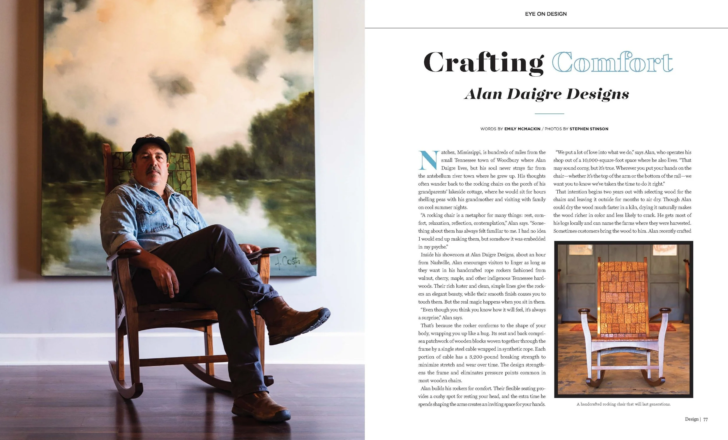 A man sitting in a handcrafted wooden rocking chair with a painted landscape behind him and a page of a magazine or book to the right.
