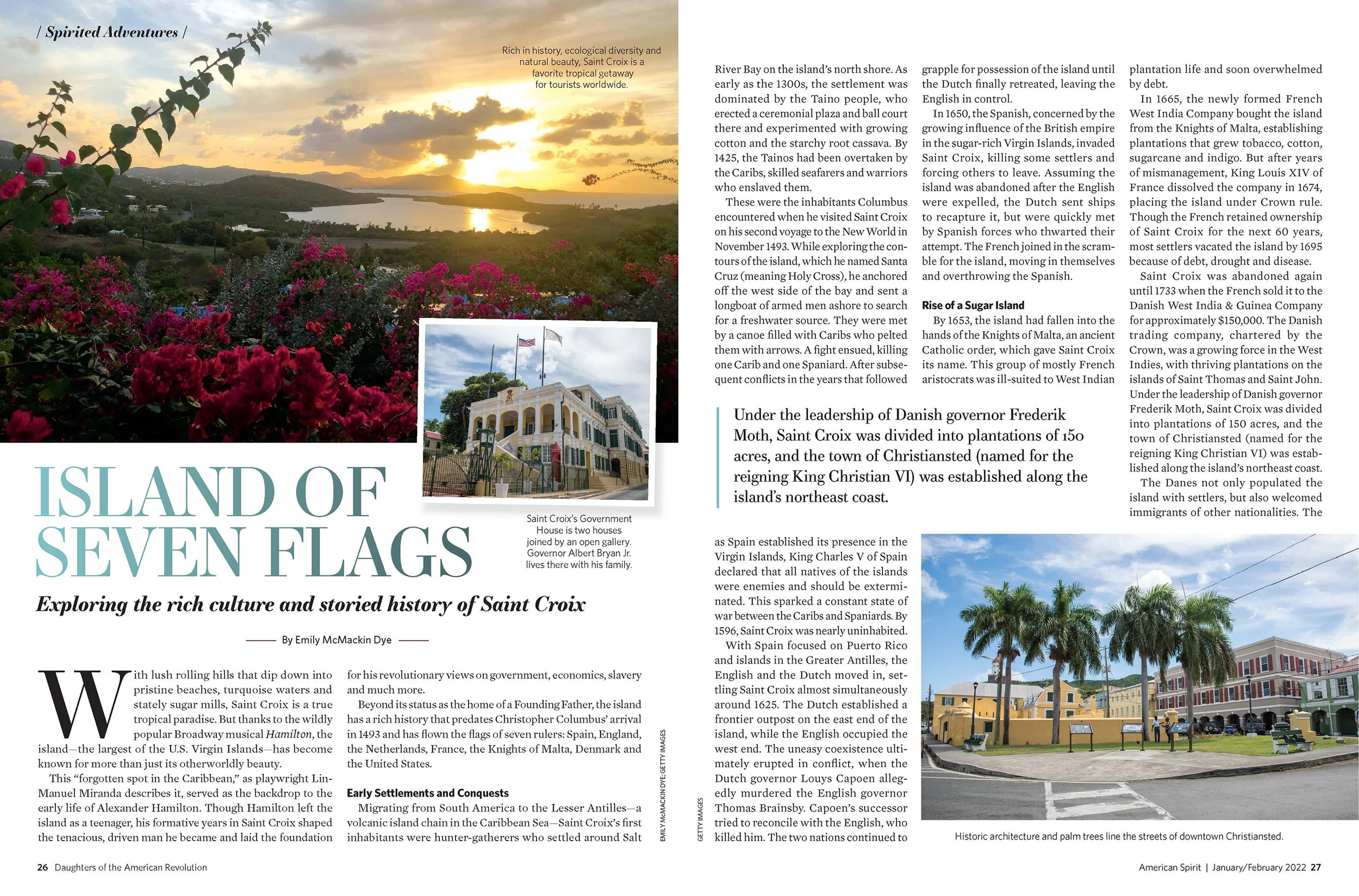 A scenic view of Saint Croix with a sunset over a river, surrounded by green hills and a mix of pink and purple flowers in the foreground, with a small inset photo of Saint Croix's government house and a historic downtown street scene with colorful buildings and palm trees.