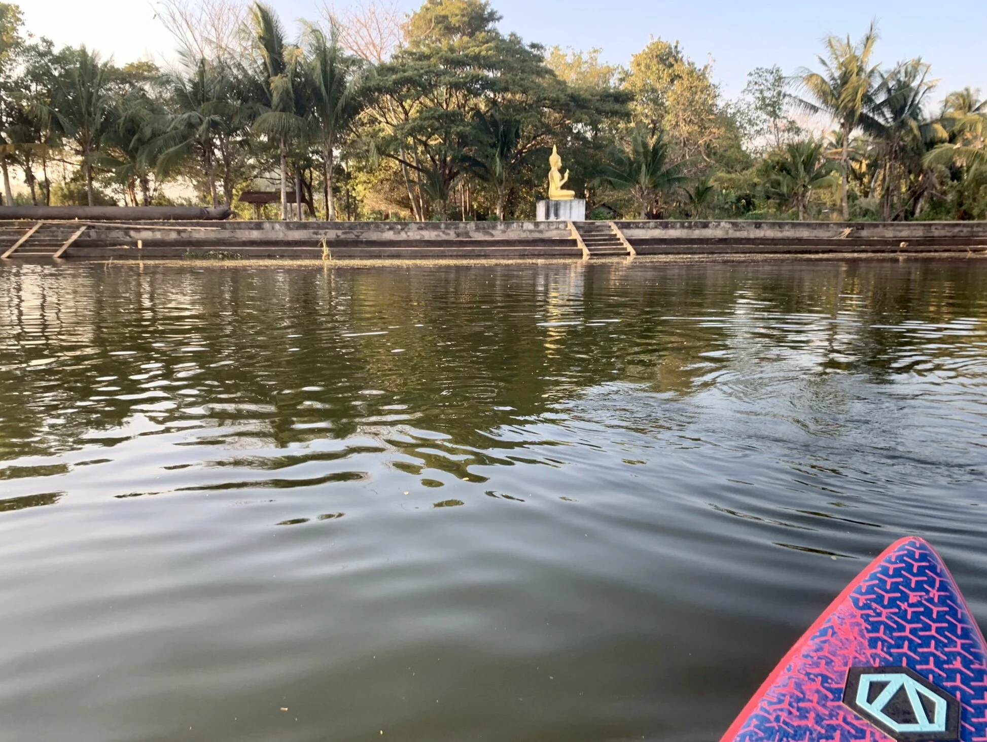 Paddling past one of Thailand’s ubiquitous Buddha statues!