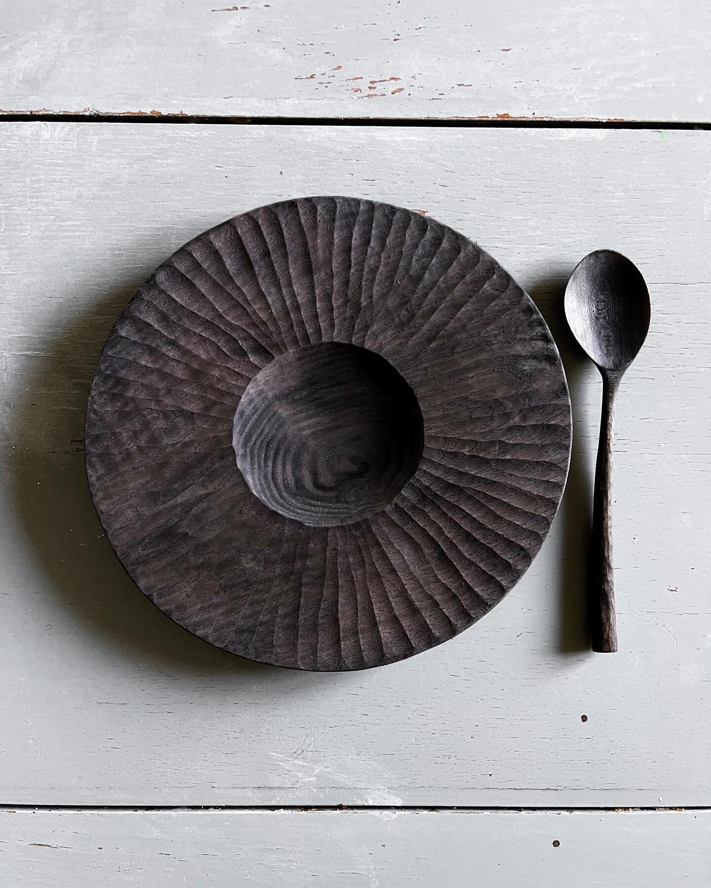 Cherry spoon, ash plate. Both ebonized (but not yet oiled, which&rsquo;ll add even more depth to the coloring). 
.
.
#woodenplate #woodenspoon #carvedplate #carvedspoon #ebonizedwood