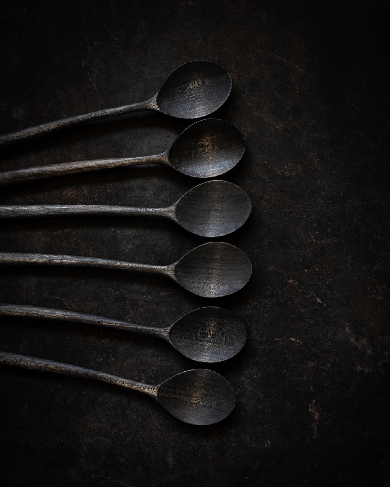 Six cherry spoons in a neat little row, dancing their way to the rainbow.
