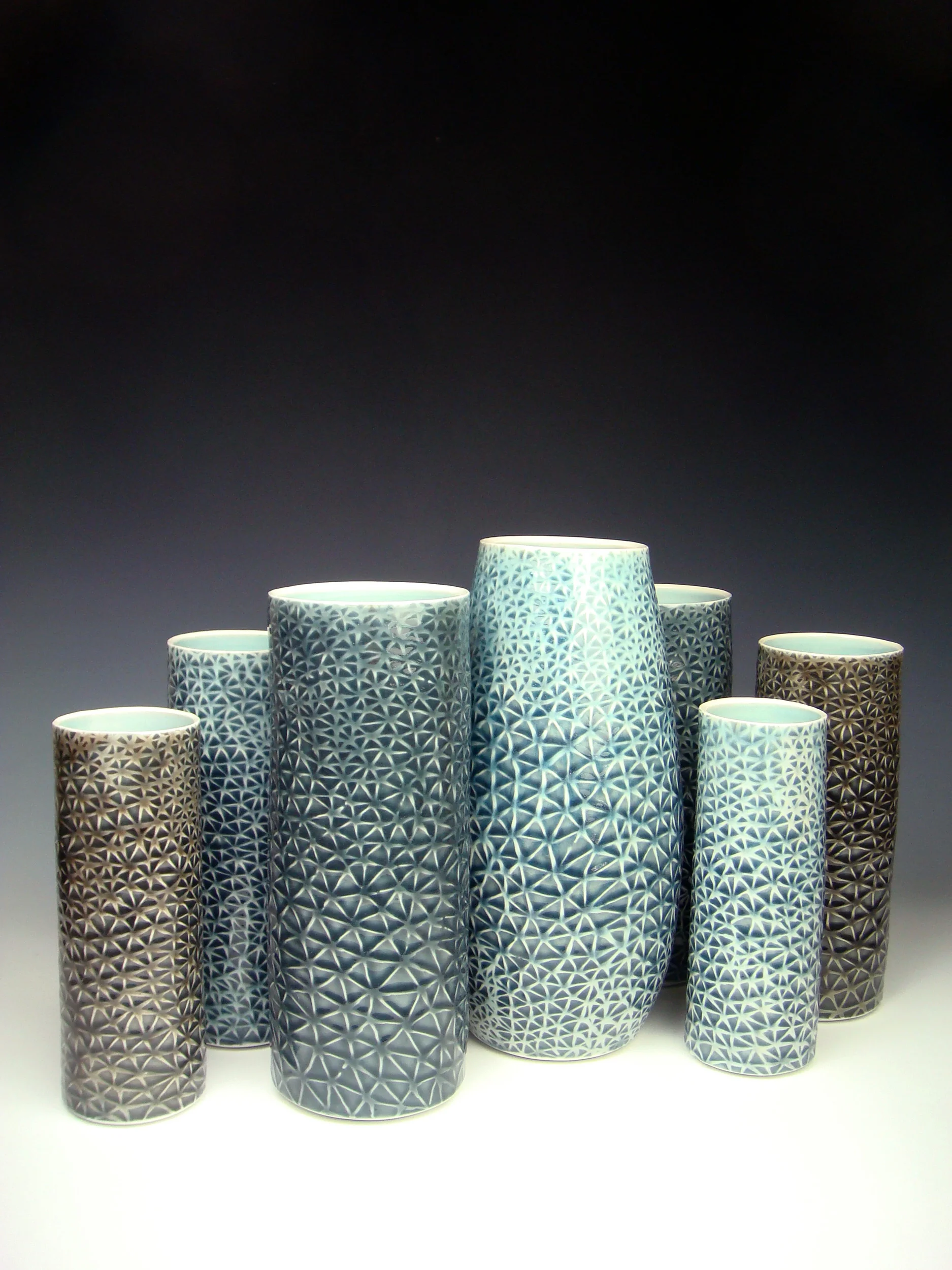Plexus, 2010. Thrown and water-etched porcelain. Set of 7, Height 31.5cm