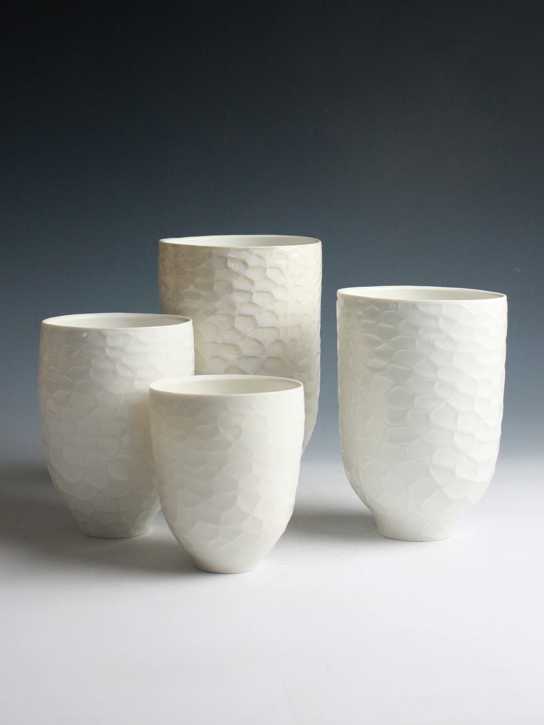 Four Bowls, 2011. Thrown and water-etched porcelain. Height 20cm
