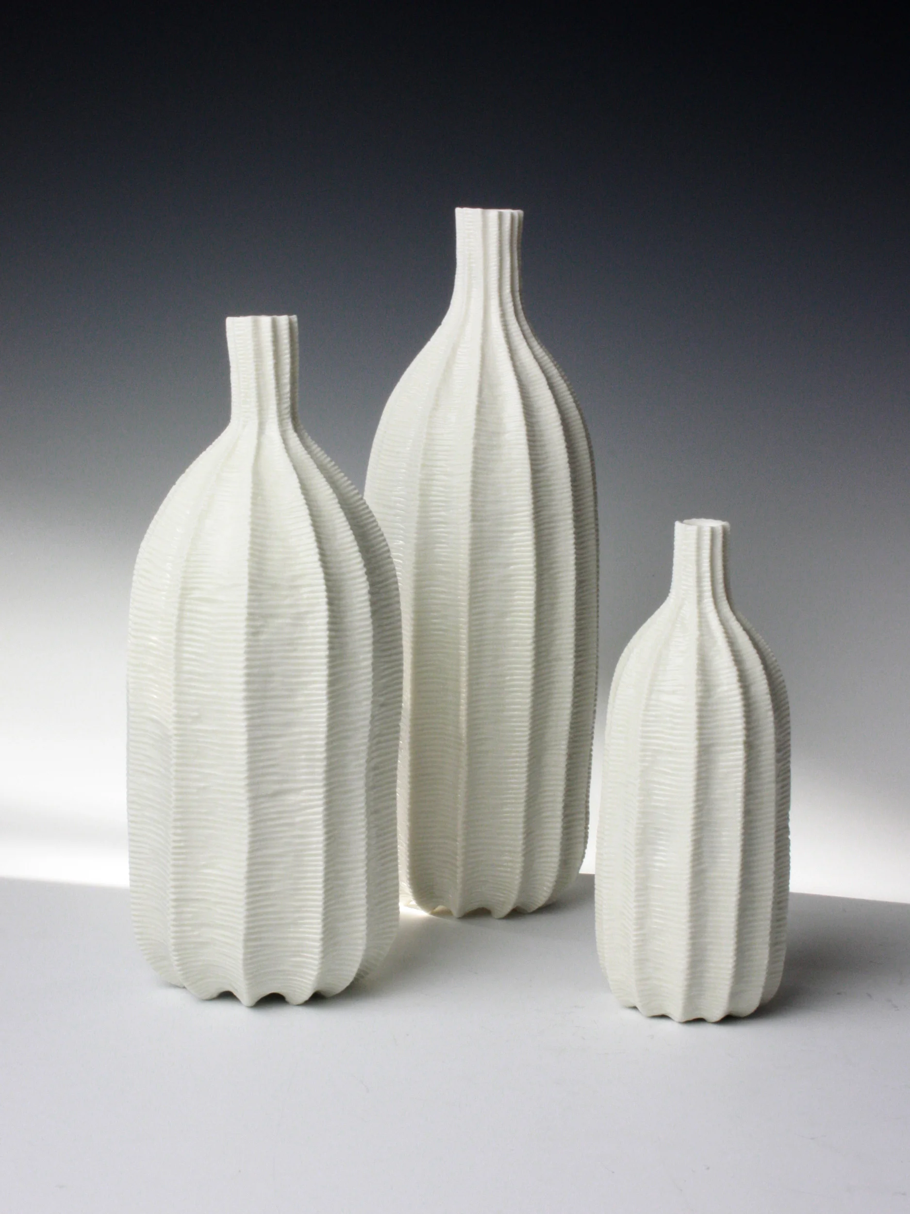 Set Of Three Pod Vases, 2012. Thrown and carved porcelain, height 27cm