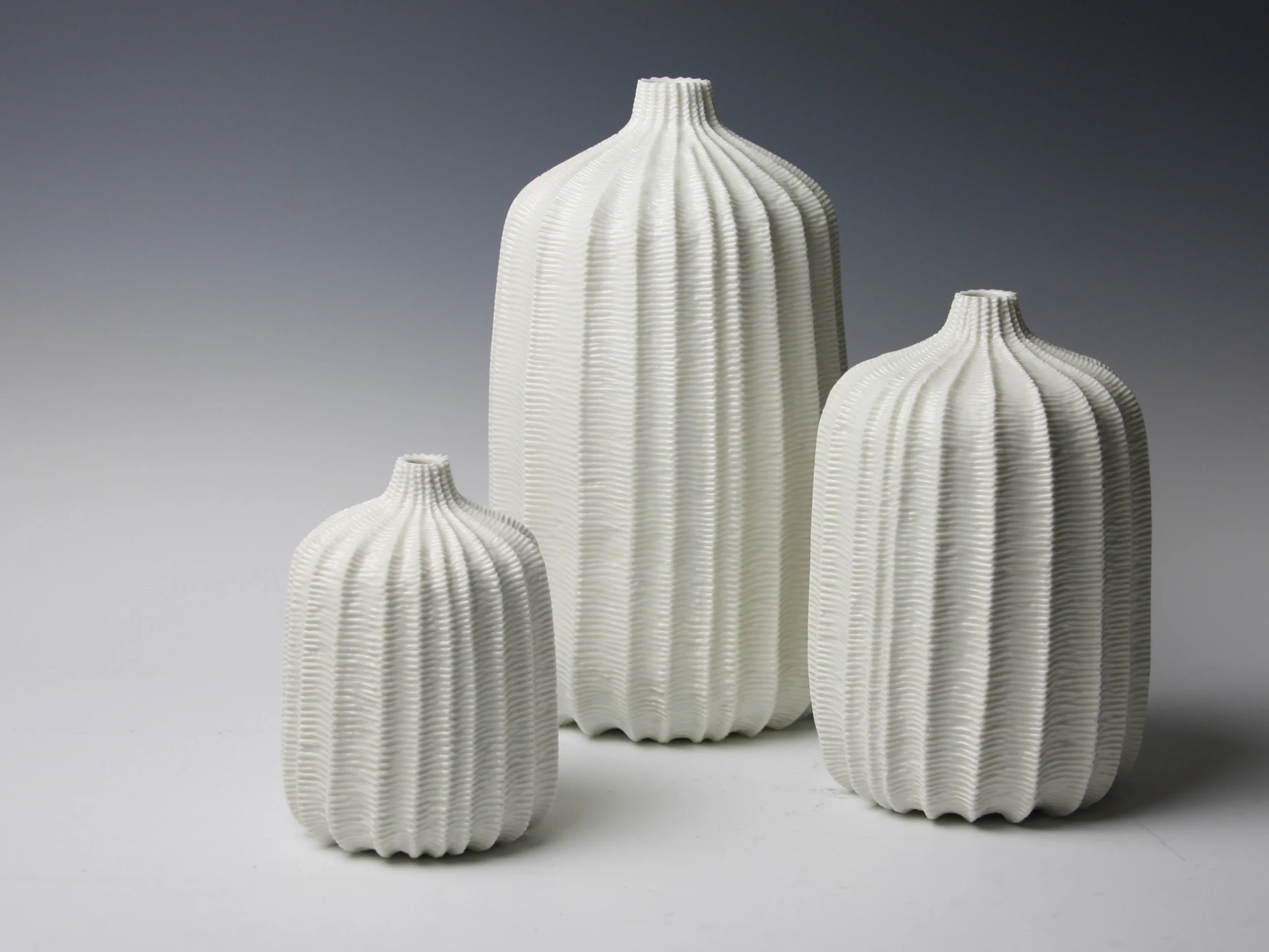 Set of Three Pod Vases, 2013. Thrown and carved porcelain. Height 32cm