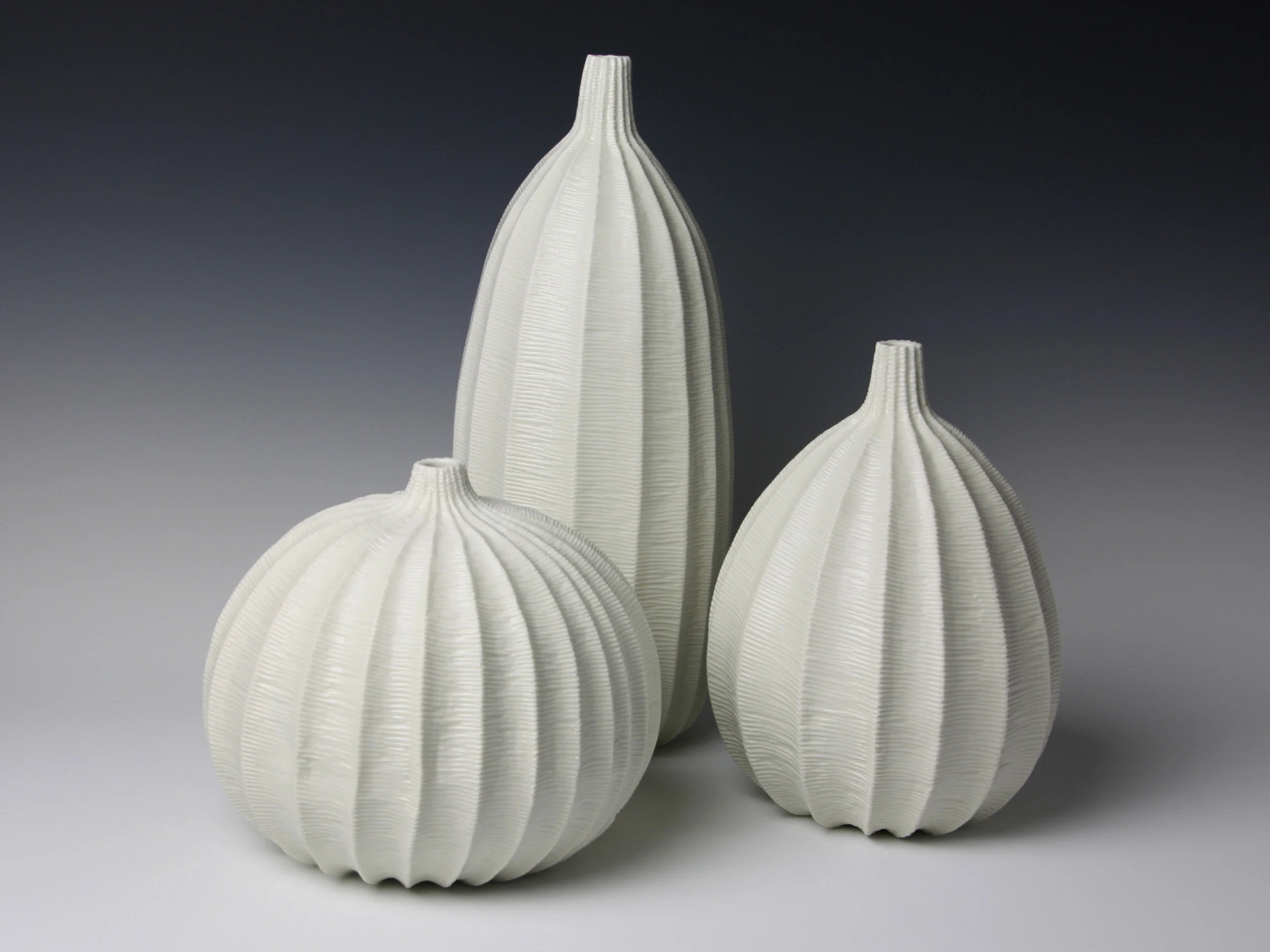 Set Of Three Vases, 2013. Thrown and carved porcelain, height 36cm