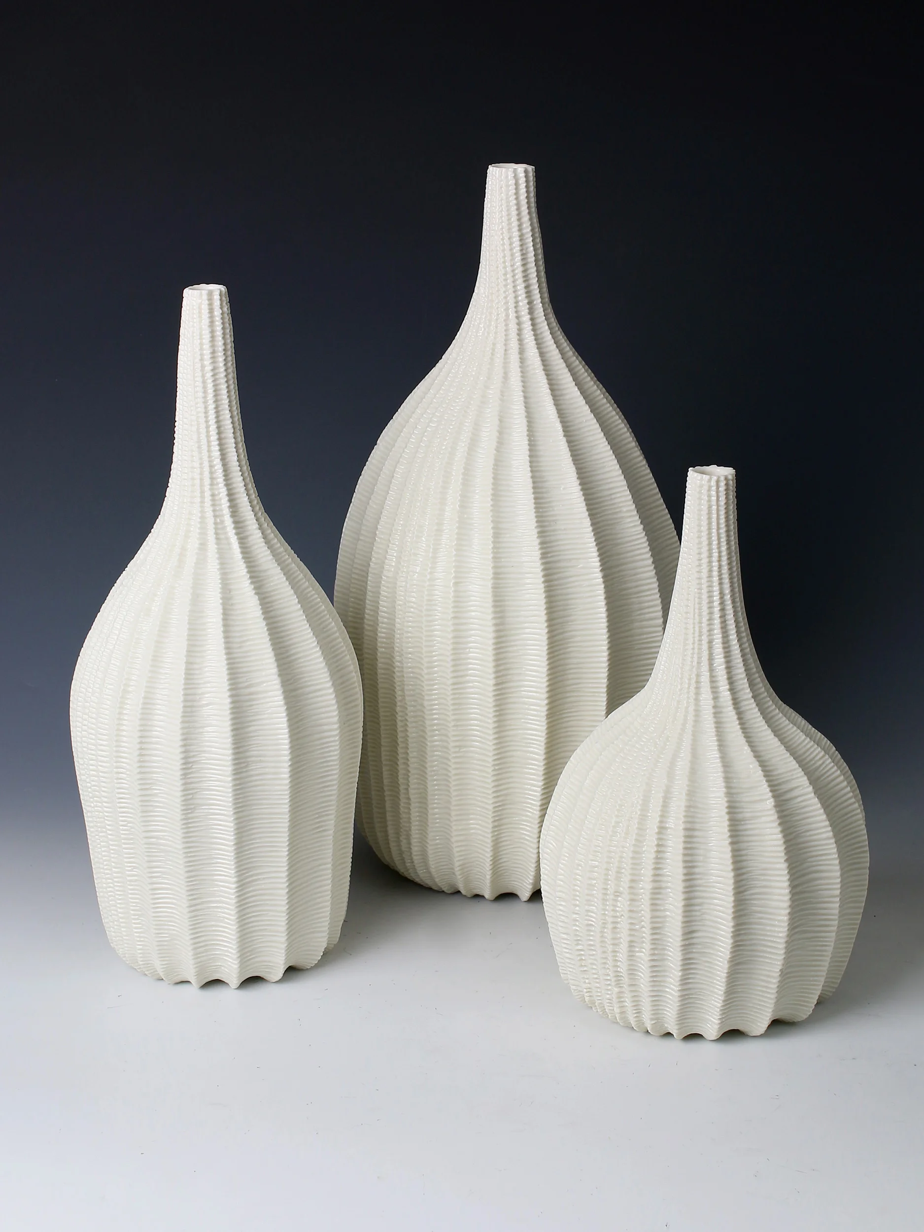 Three Drop Vases, 2016. Thrown and carved porcelain, height 35cm