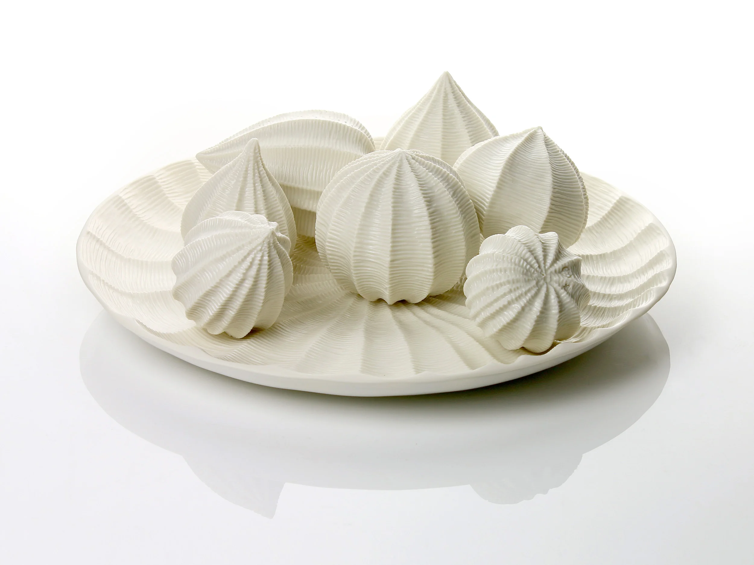 Plate With Seven Fruits, 2016 -2017. Thrown and carved porcelain, diameter 30cm