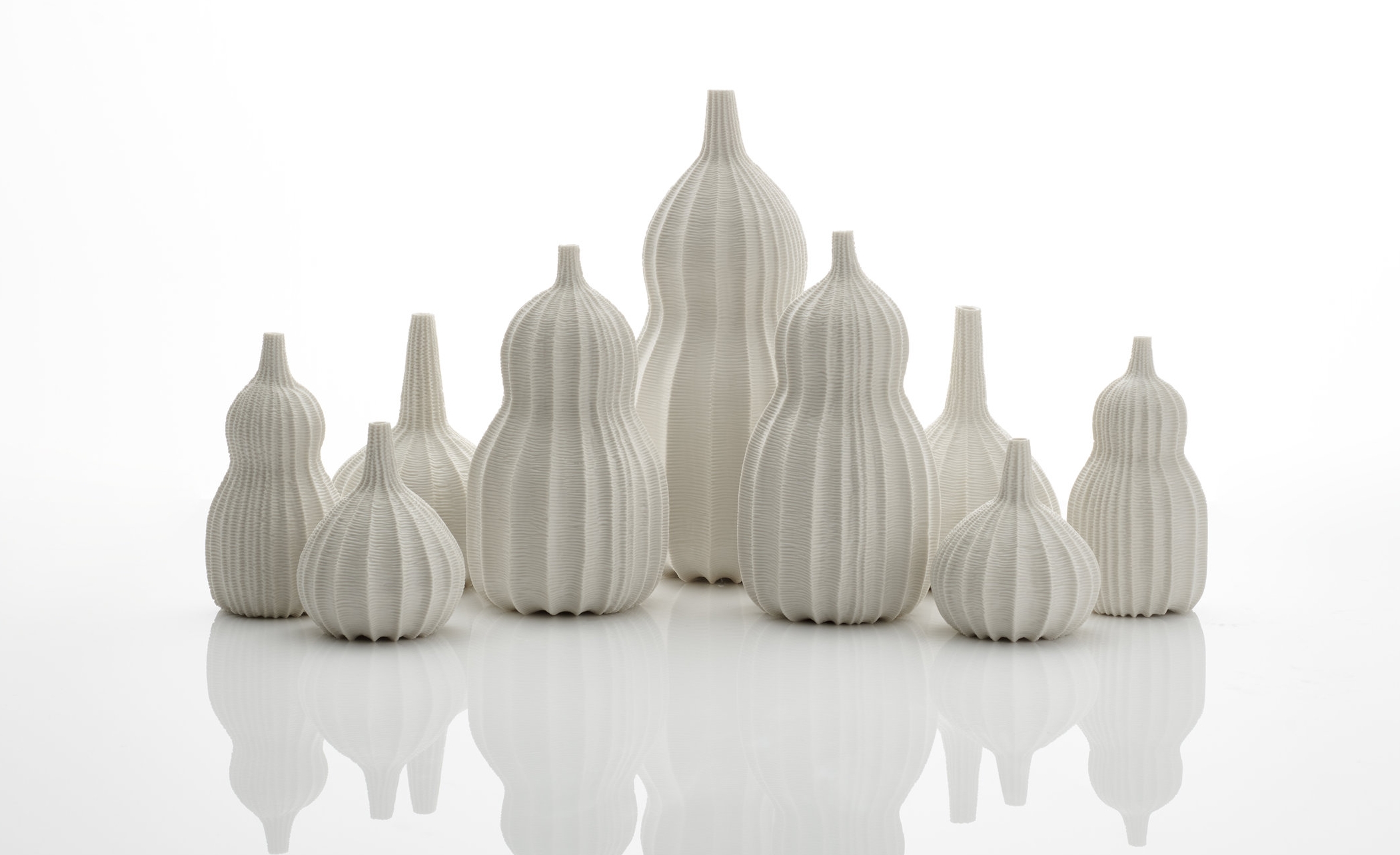 Garniture of Nine Vases, 2018. Thrown and carved porcelain, height 33cm