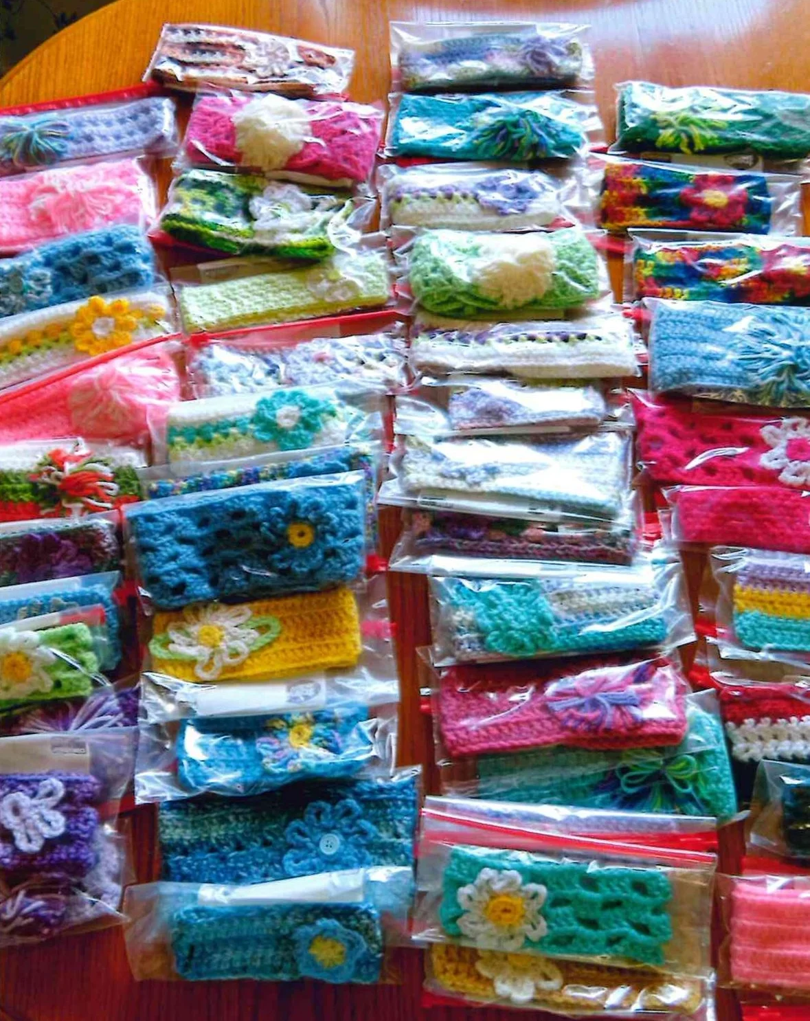 Headbands created by our Mary Martha Crochet Group, packaged up and ready to mail!