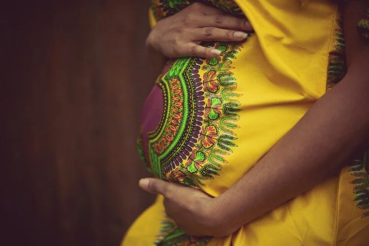 african woman pregnant.jpg