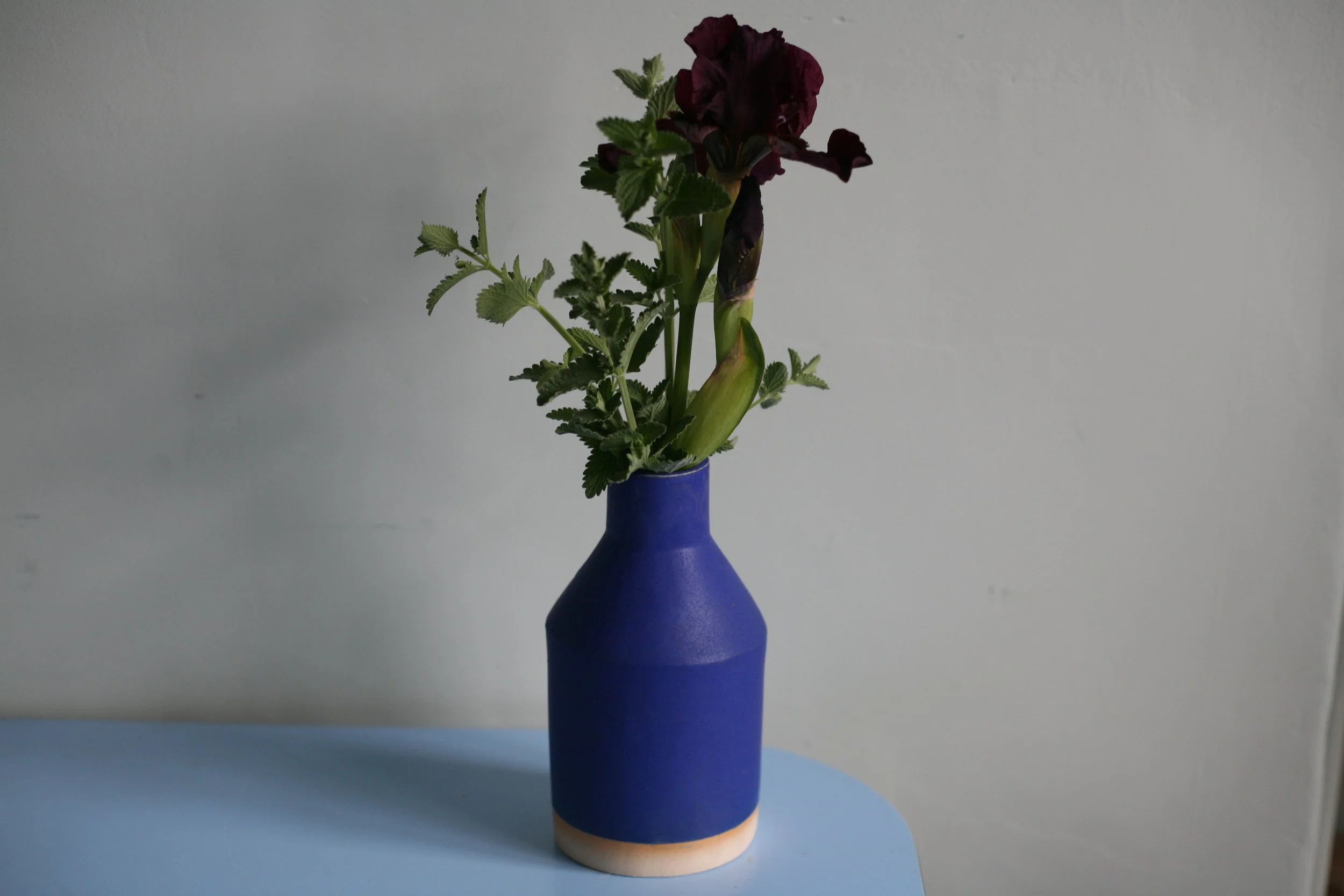 Bottle vase in bright bright blue