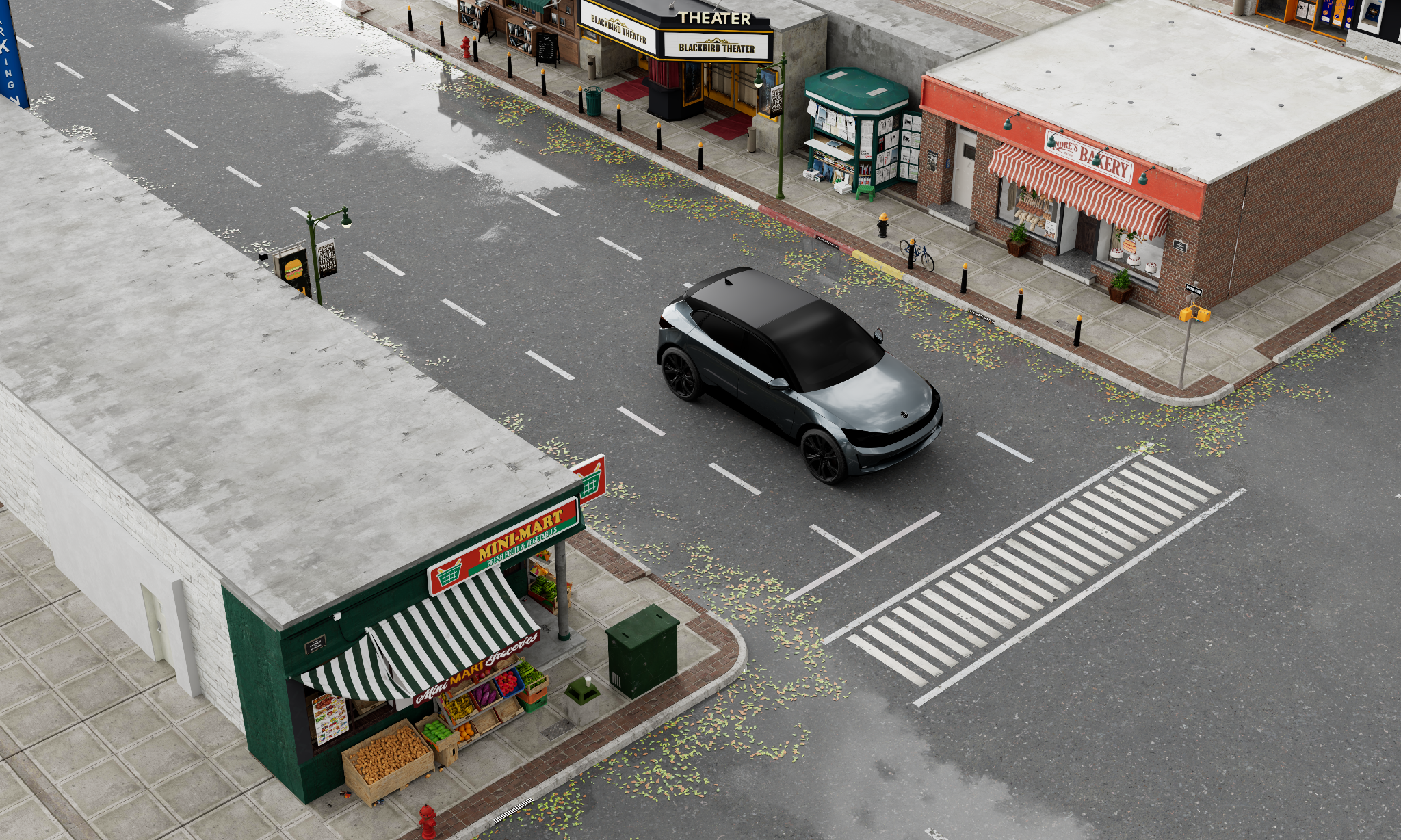 Empty city street with a black car, a Buy Mart grocery store, bakery, and theater entrance. Fallen leaves on the wet pavement, lampposts, street signs, and a crosswalk visible.