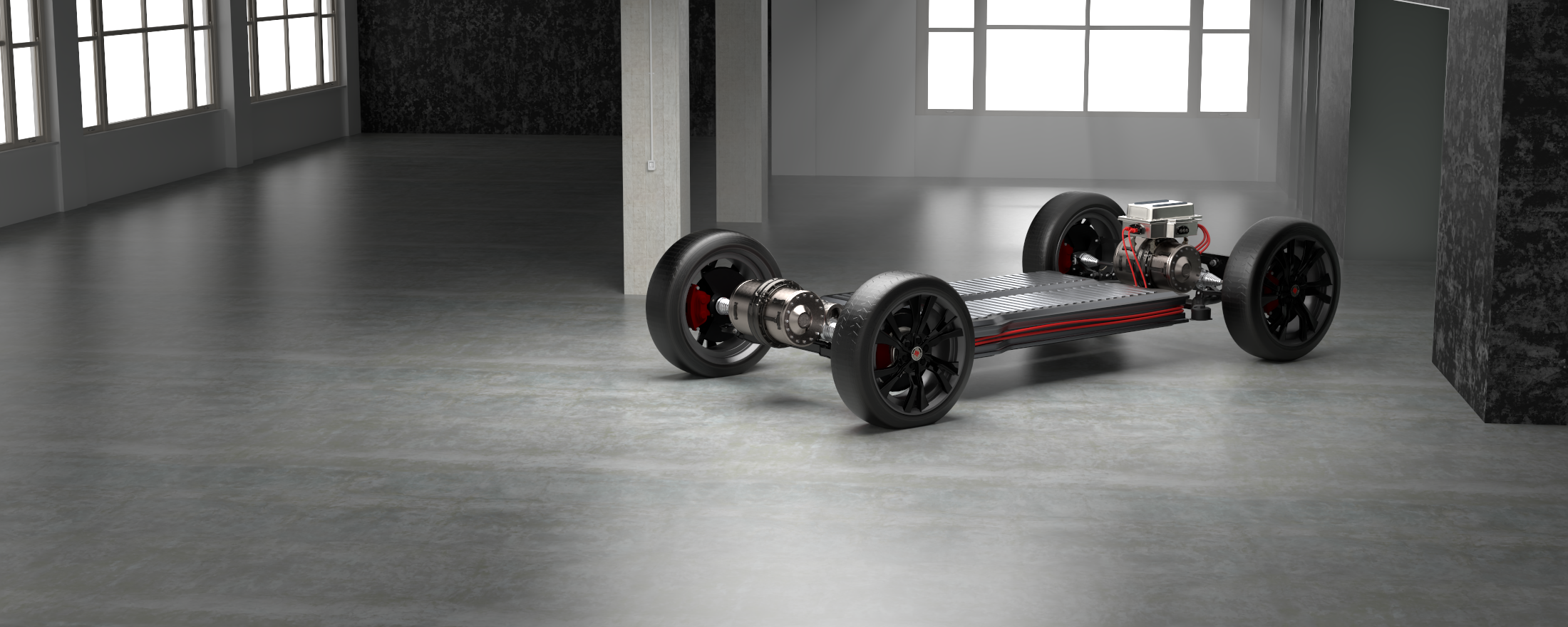 Modern electric vehicle chassis with four wheels, motors, and electronic components in a spacious, industrial-style room with large windows and concrete floors.