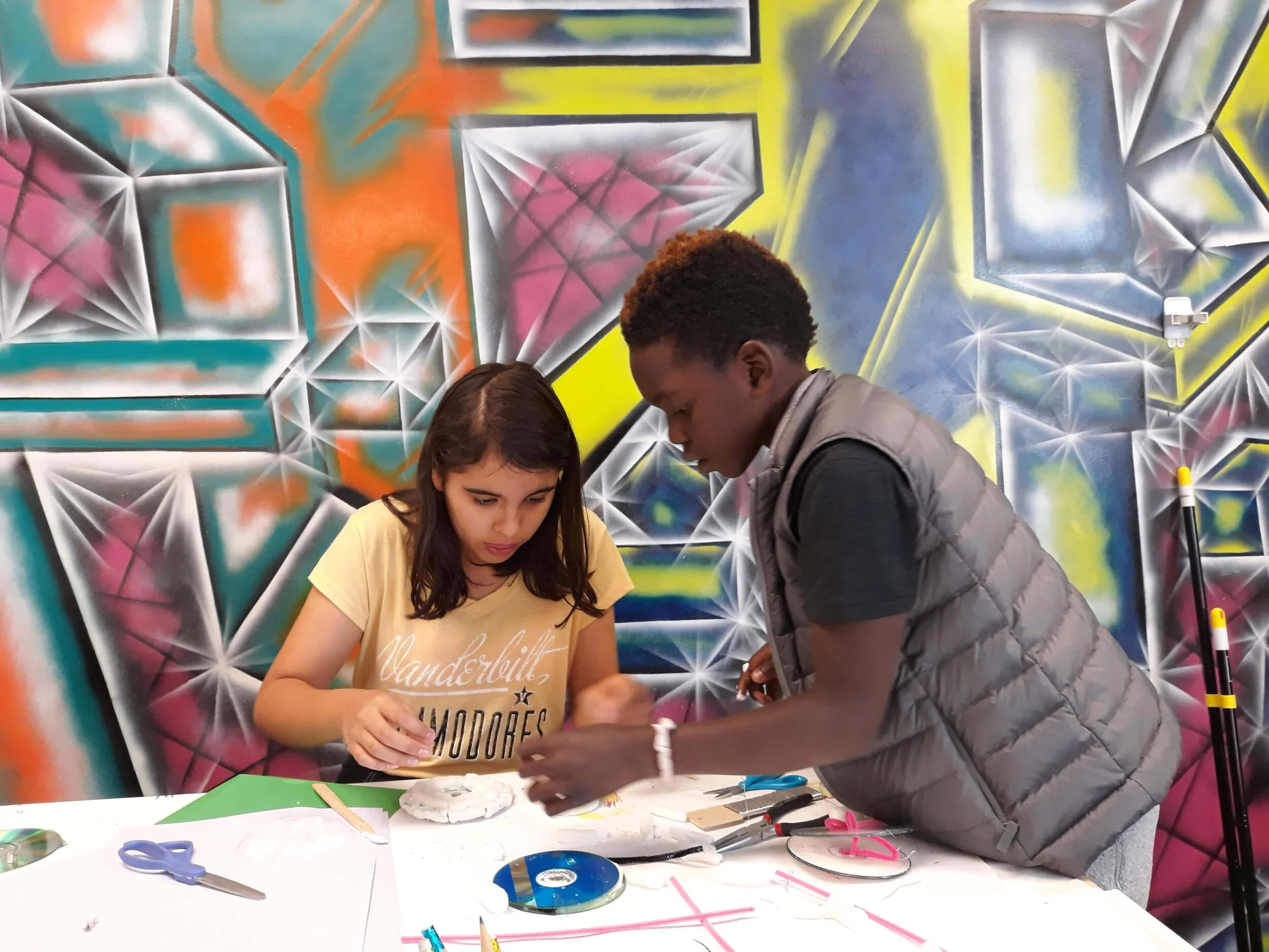 Students collaborating and creating in Makerspace