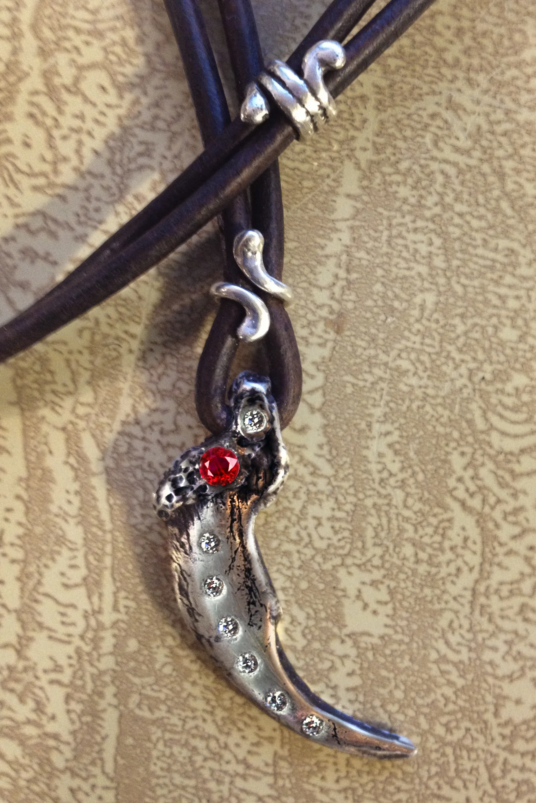 Lupita, Sterling Wolf Claw with Diamonds and Burmese Ruby