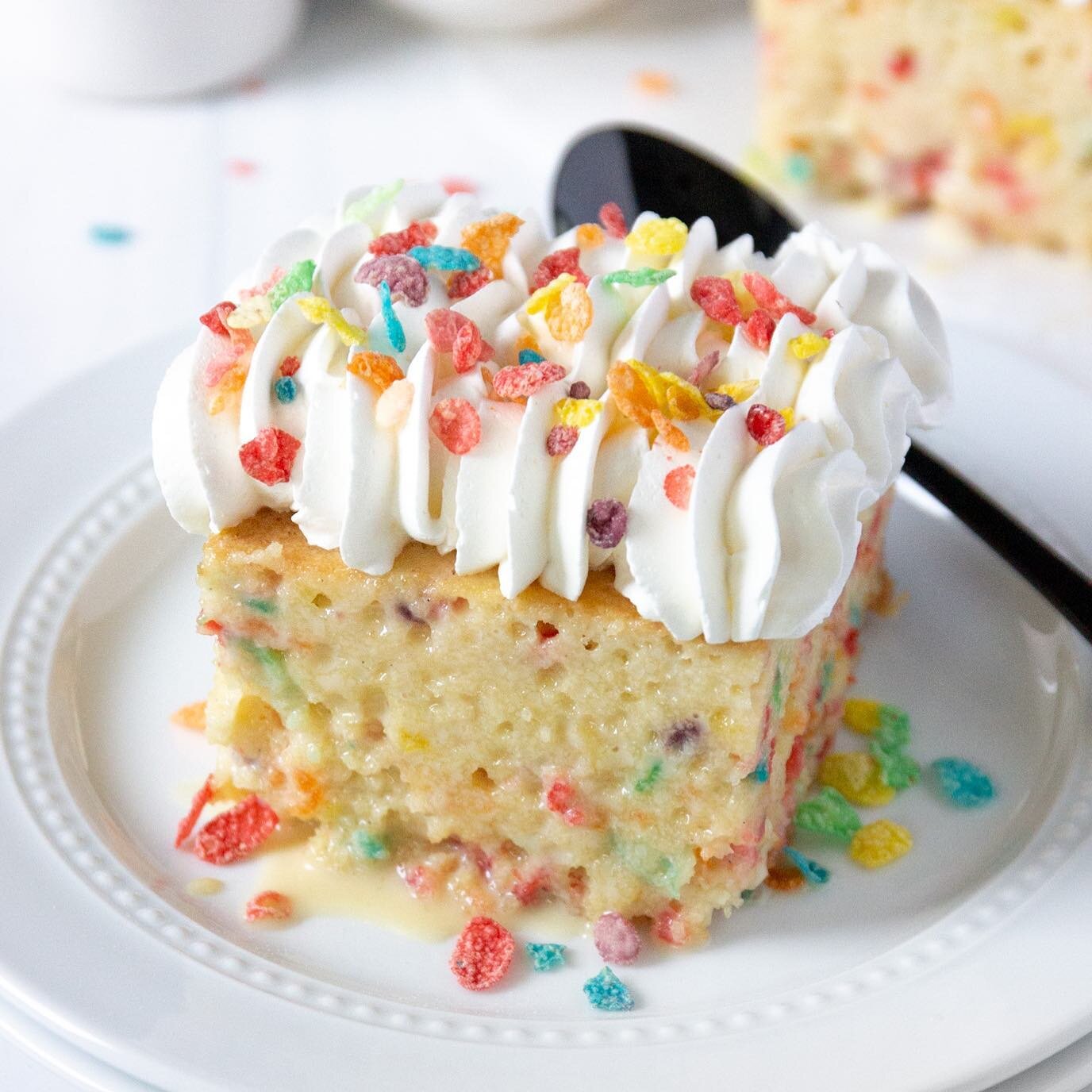 FRUITY PEBBLES TRES LECHES CAKE!! Look at that heavenly slice of deliciousness 😍 Stop by either location and grab a piece to celebrate National Cereal Day today!! 🤩

📸: @amy.sheree #livelifeonecupcakeatatime #designerdessertsbakery