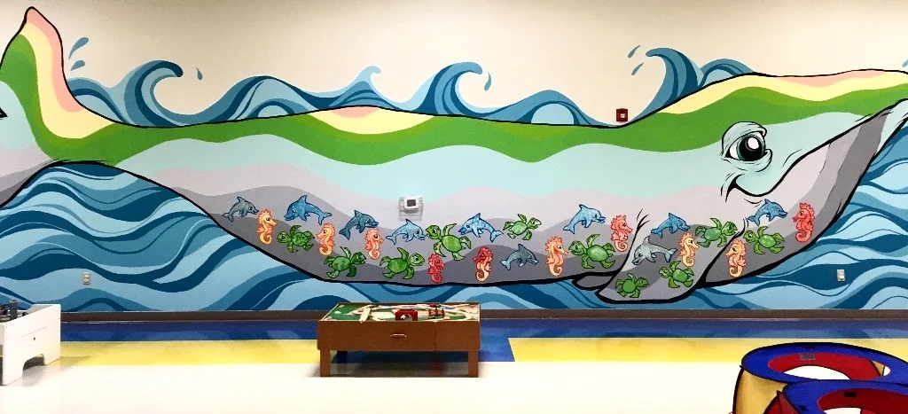The final Pearl Buck Center mural by Bayne Gardner and students. 