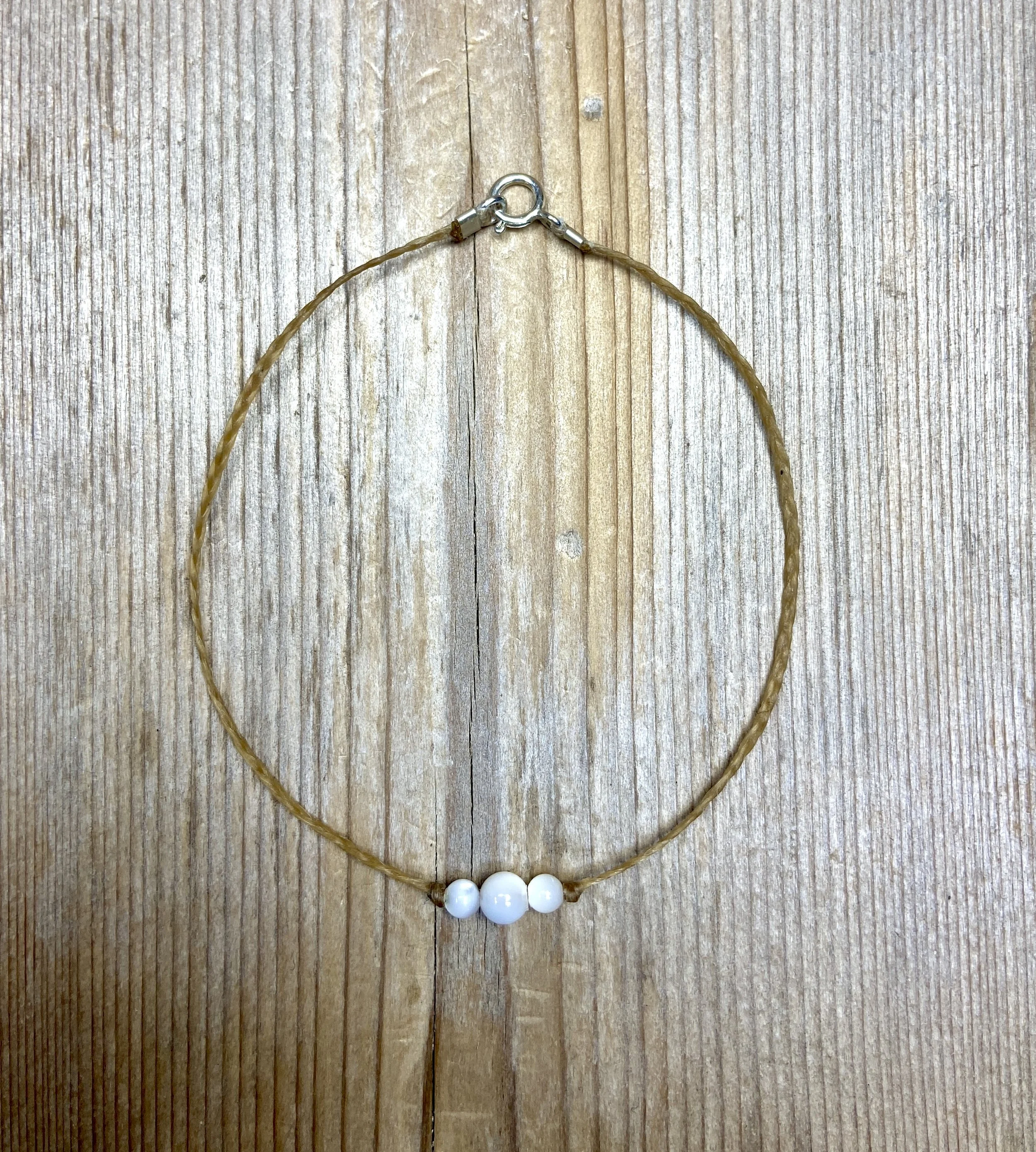 7" white mother of pearl tri-stone bracelet $28
