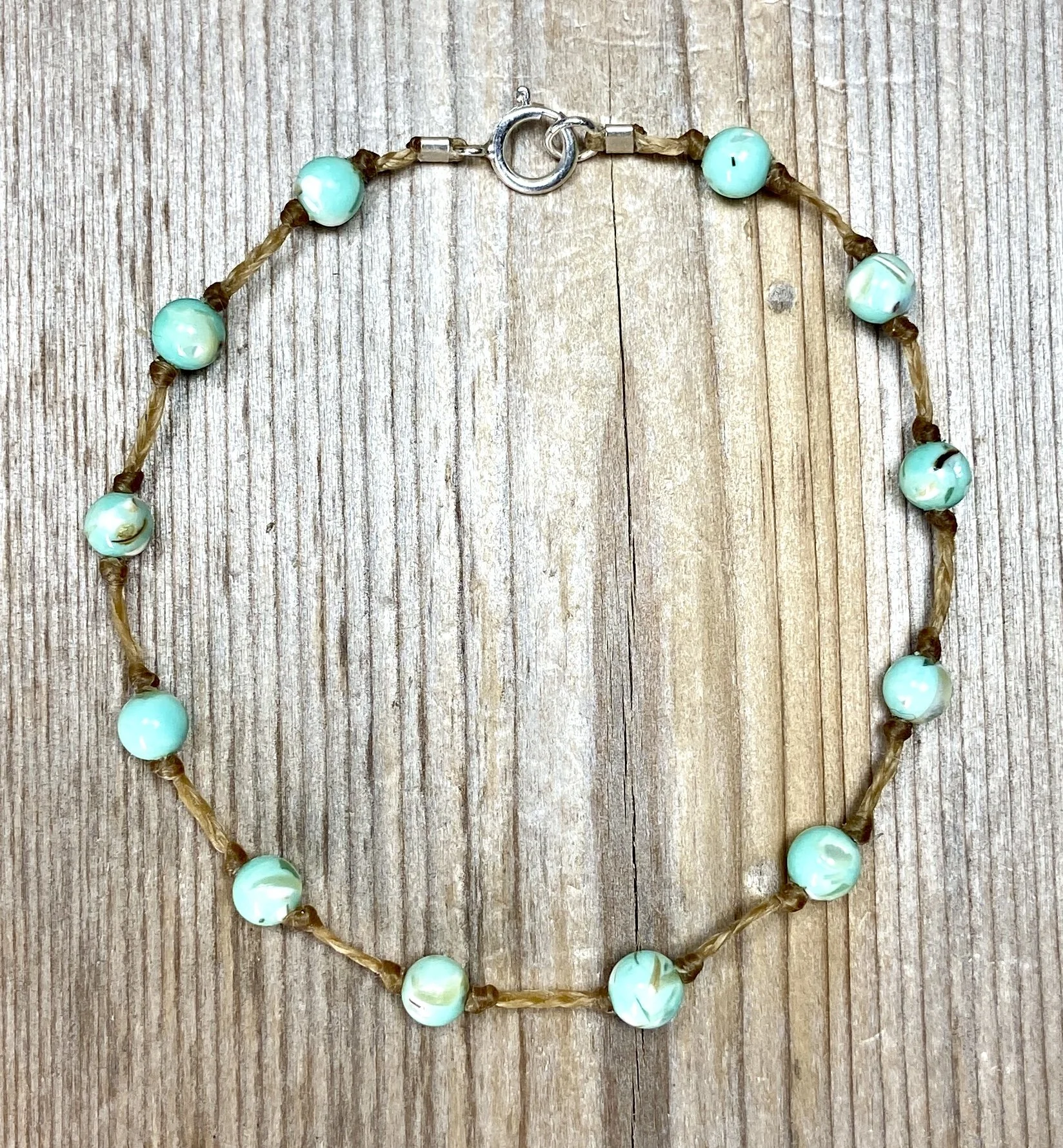 7" stabalized turqioise with australian shell multi-stone bracelet $40