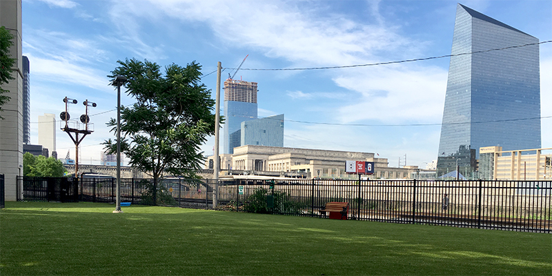 image of artificial grass installation near FMC Tower