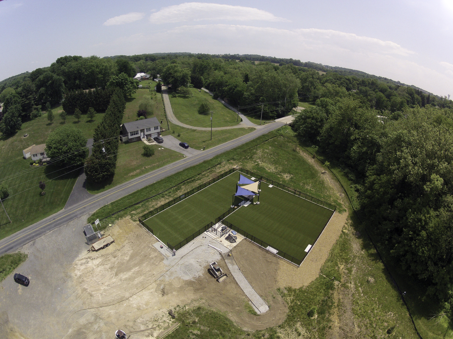 image of aerial view of artificial grass at a dog park