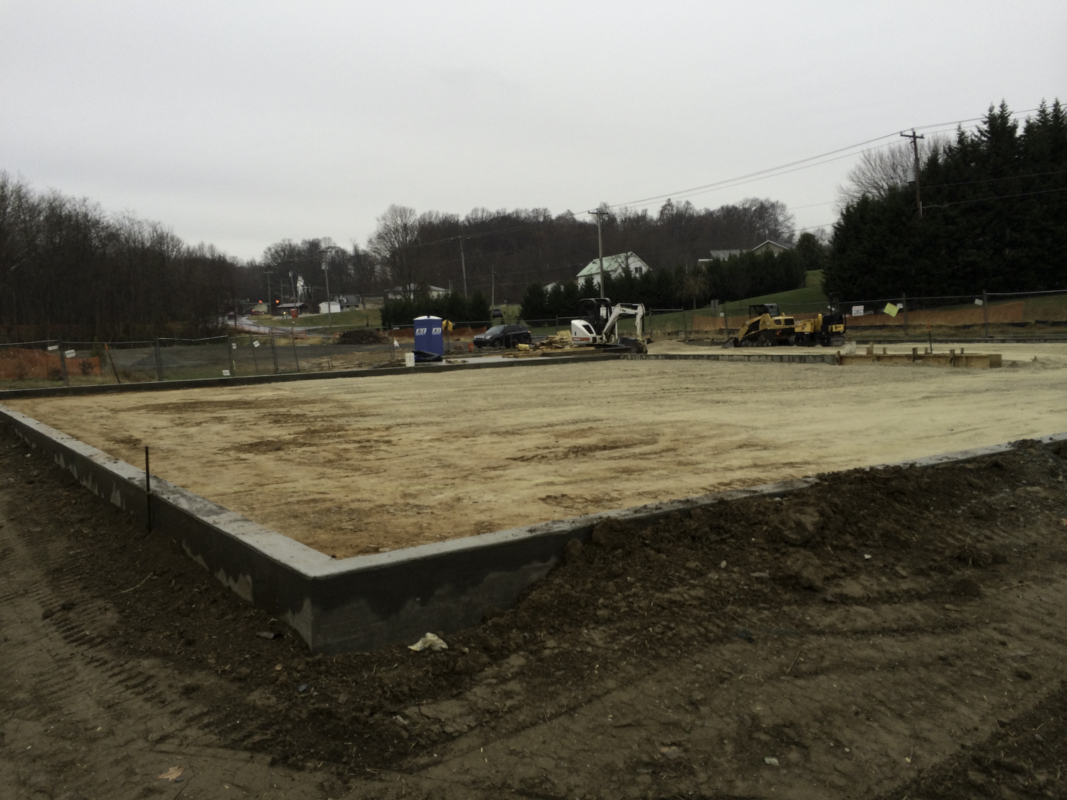 image of ground before artificial turf for dogs was installed