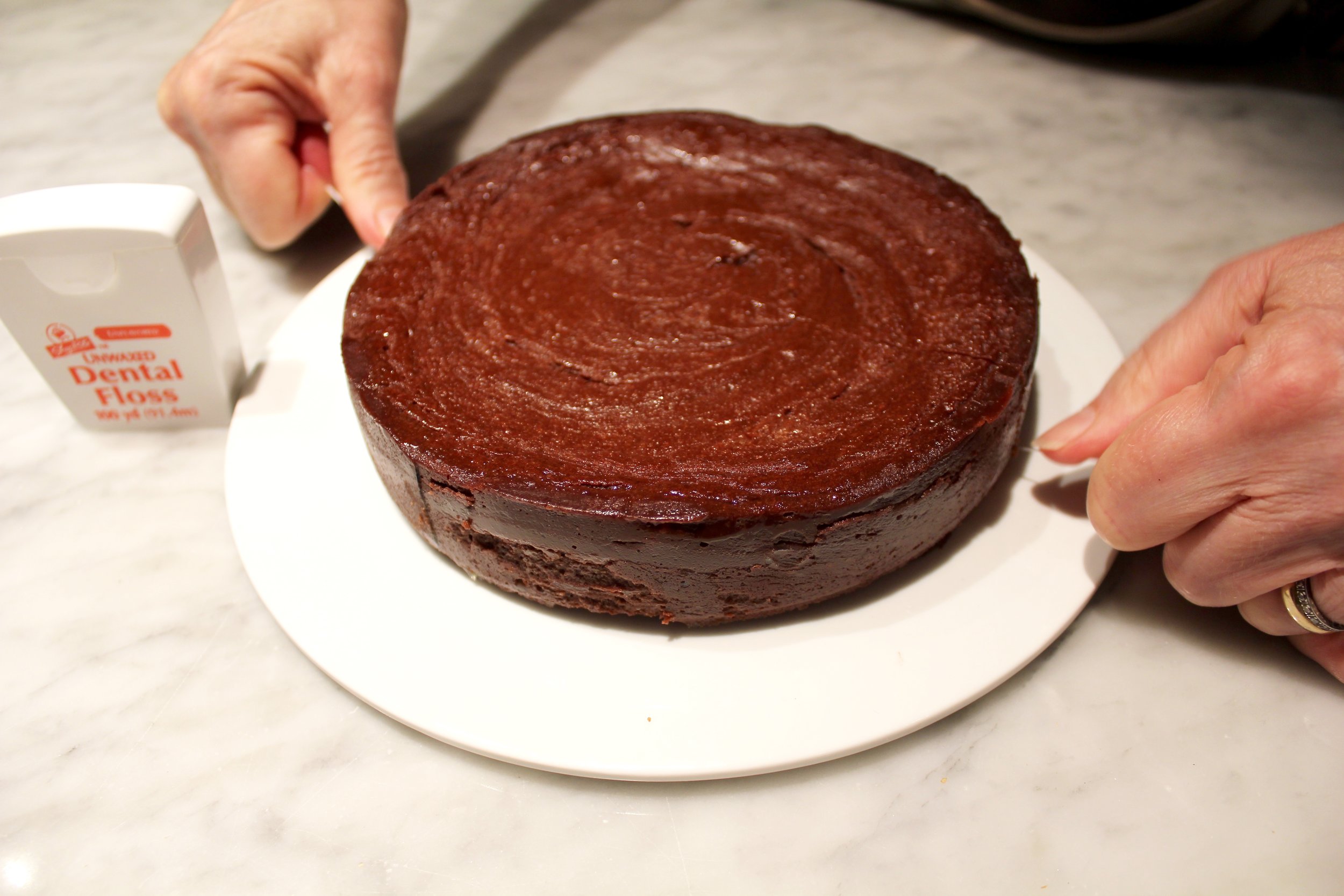 5 Pressing & saw like action thru the cake