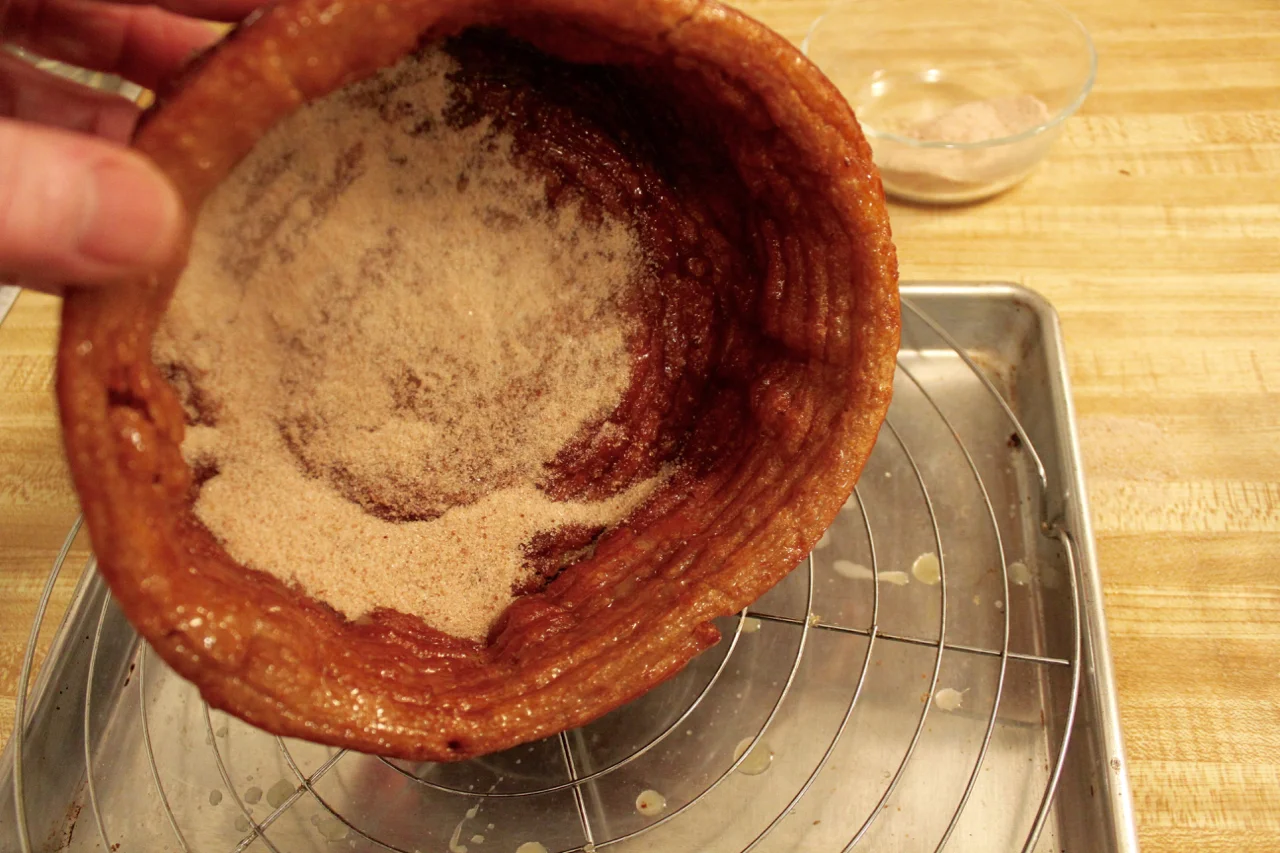 3) spooning sugar onto shell's inside