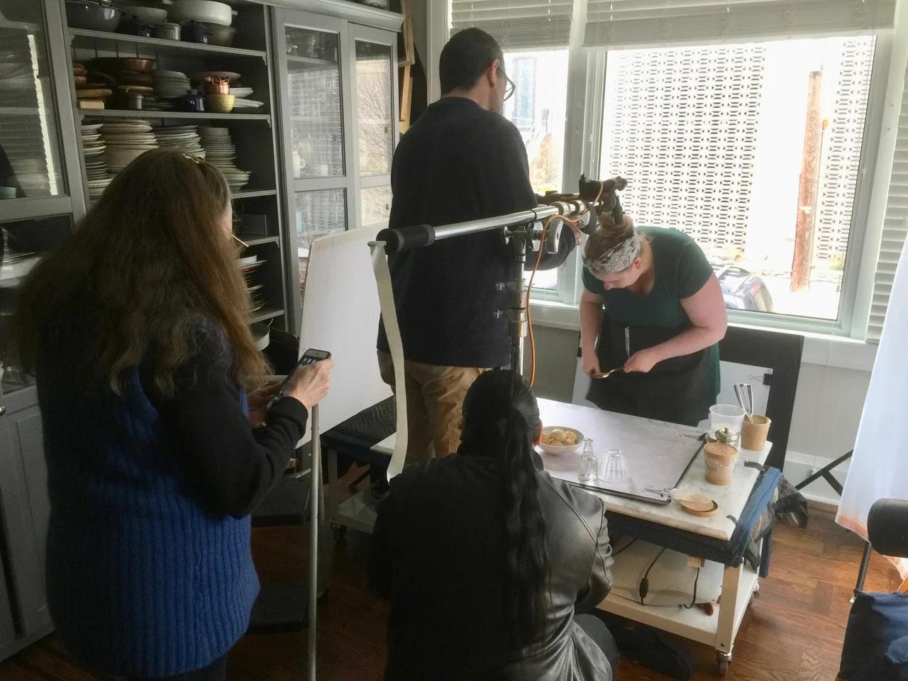 Erin Mc Dowell perfecting a bowl of ice cream with Matthew Septimus lining up his camera