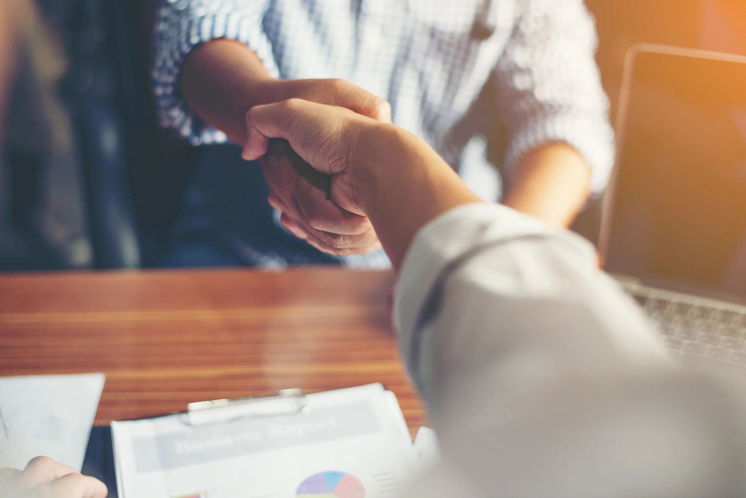 BusinessPeopleHandshakeGreetingDealatwork.(1).jpg